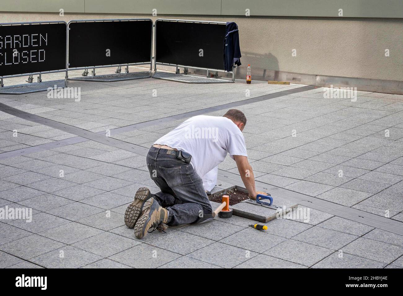 Craftsman, pavers at work, Berlin, Germany Stock Photo