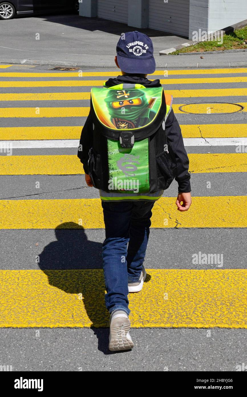 Schoolchild Pedestrian crossing (MR available) Switzerland Stock Photo