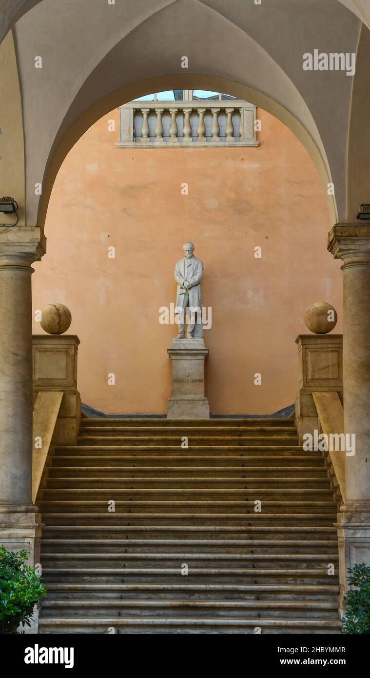 The marble staircase of Palazzo Doria-Tursi, seat of the town hall of Genoa, with the statue of Giuseppe Mazzini (1805-1872), Liguria, Italy Stock Photo