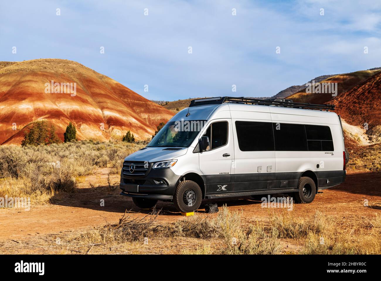 Airstream Interstate 24X 4WD campervan; Painted Hills; geologic site; John Day Fossil Beds National Monument; near Mitchell; Oregon; USA Stock Photo