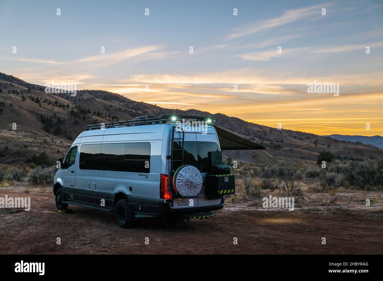 Sunset view of Airstream Interstate 24X 4WD campervan; Painted Hills; geologic site; John Day Fossil Beds National Monument; near Mitchell; Oregon; US Stock Photo