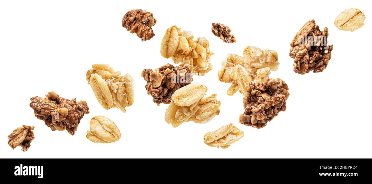 Oat granola, crunchy muesli isolated on white background Stock Photo