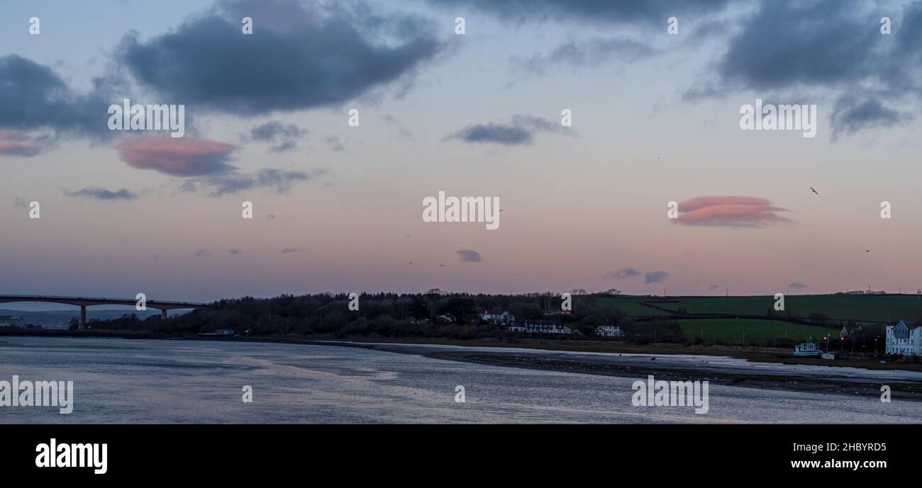 Pink sunset evening over East the Water and Torridge Estuary in North Devon, England. Stock Photo
