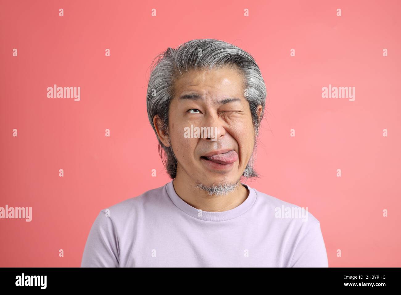 Senior man wink hi-res stock photography and images - Alamy