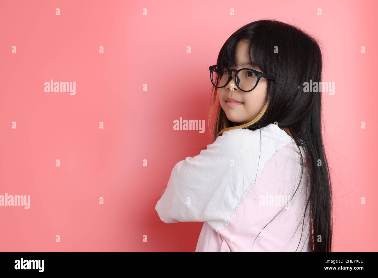 The young Asian girl portrait on the pink background Stock Photo - Alamy