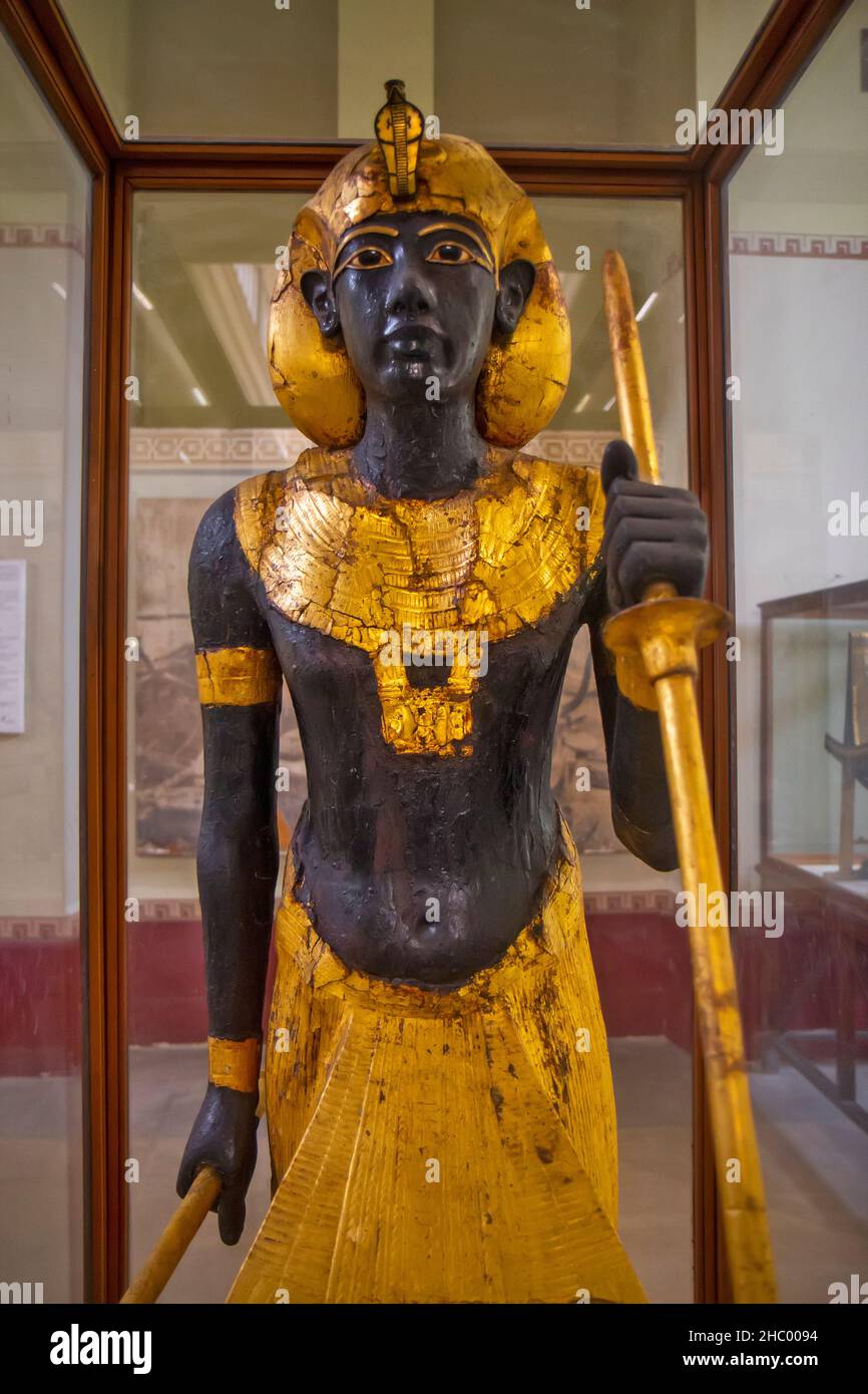 Statue of Tutankhamun wearing the Khat headdress in Cairo museum, Egypt Stock Photo