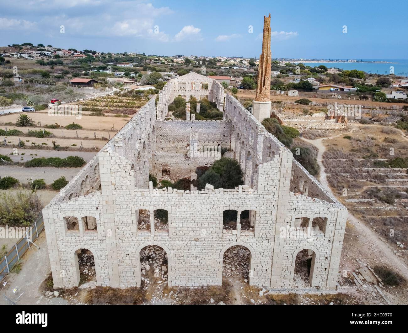 Aerial drone. Fornace Penna, monument of industrial archeology in Sampieri, Ragusa, Sicily, called La Mannara in the stories of Inspector Montalbano. Stock Photo