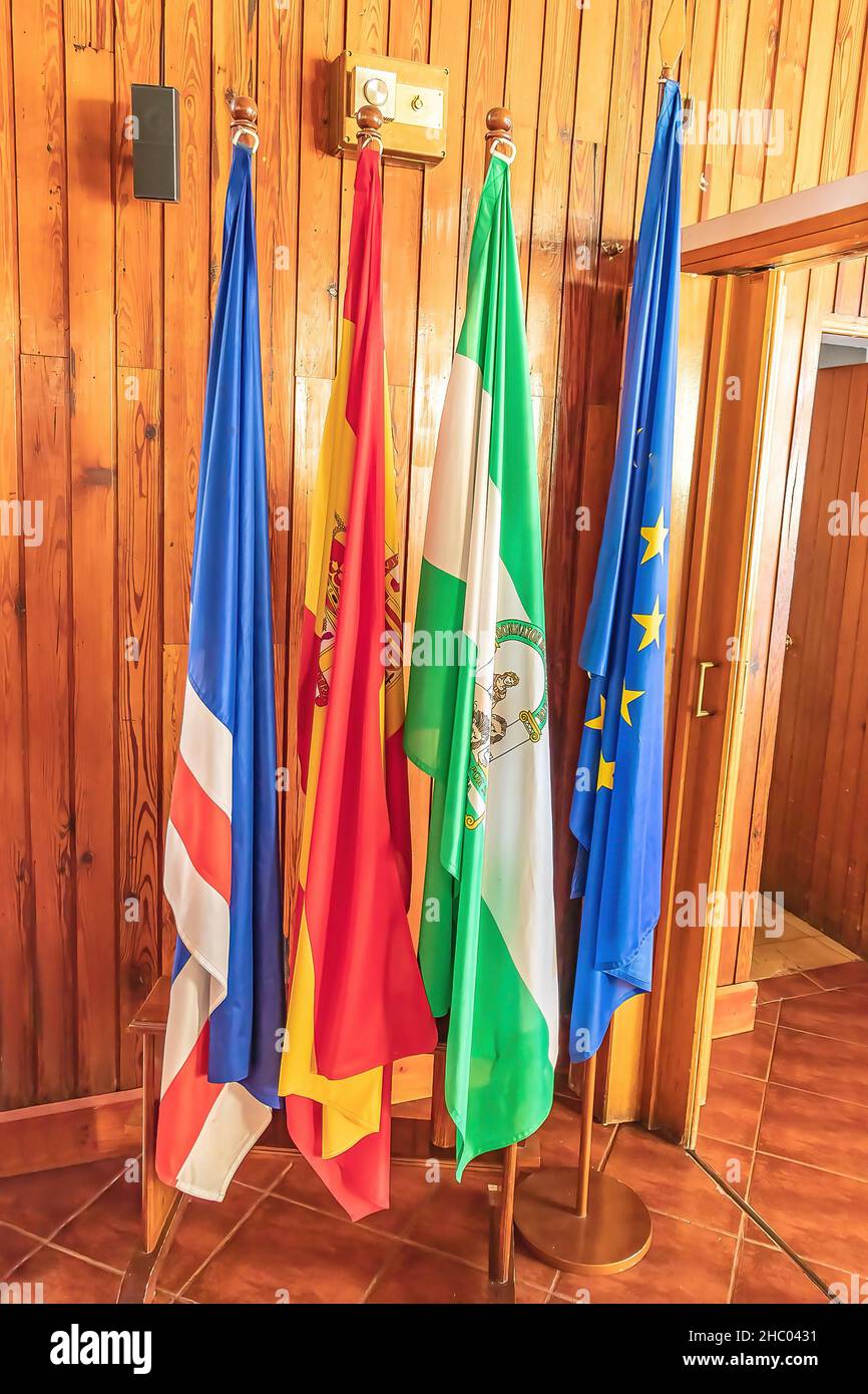 Masts with Flags of Europe, Andalusia, spain and Great Britain Stock Photo