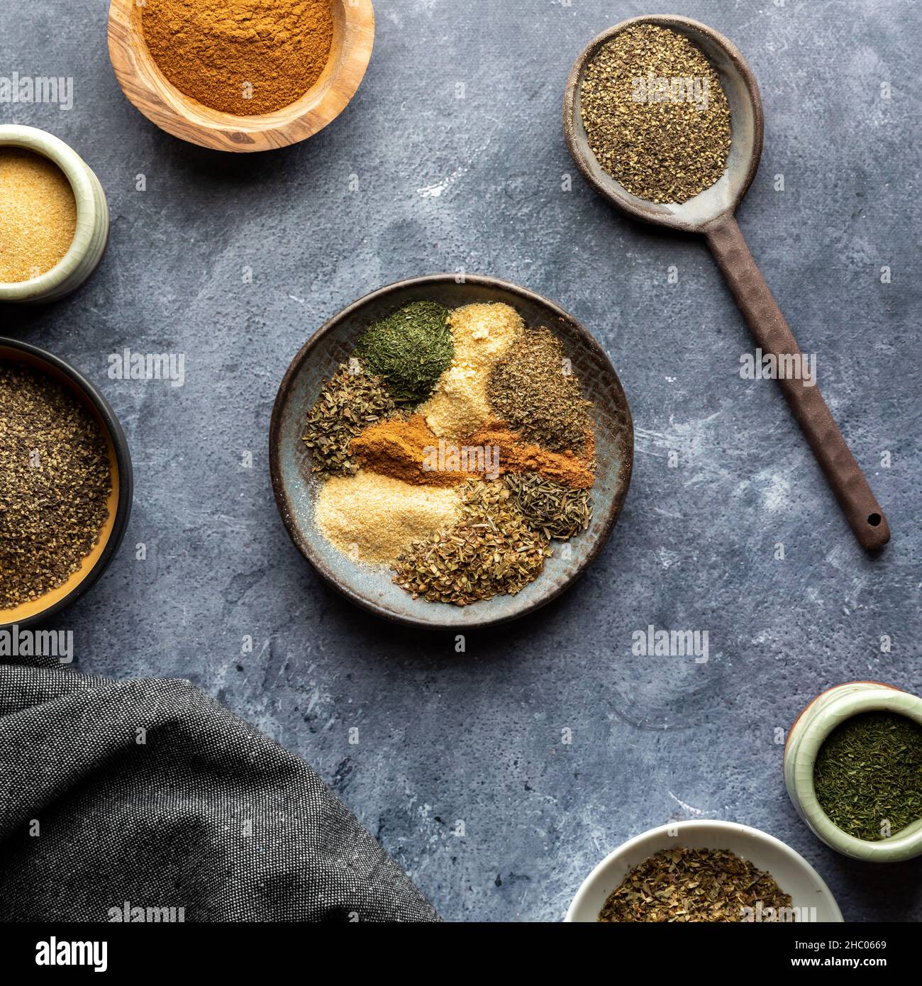 A variety of dry spices used to make a Greek spice blend. Stock Photo