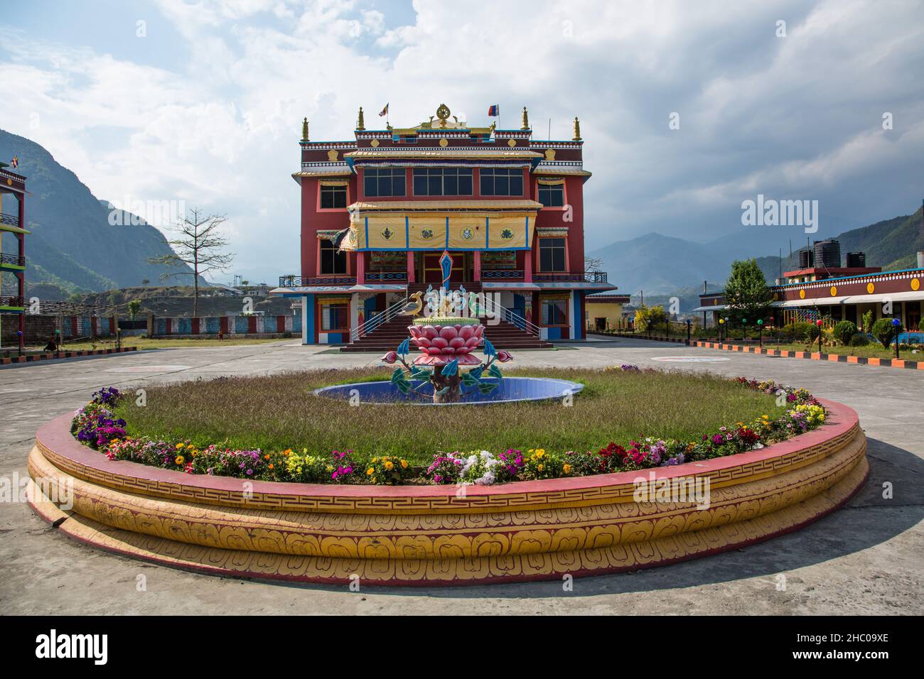 A fountain in front of the main building at the Pema Tsal Sakya Monastery near Pokhara, Nepal. Stock Photo