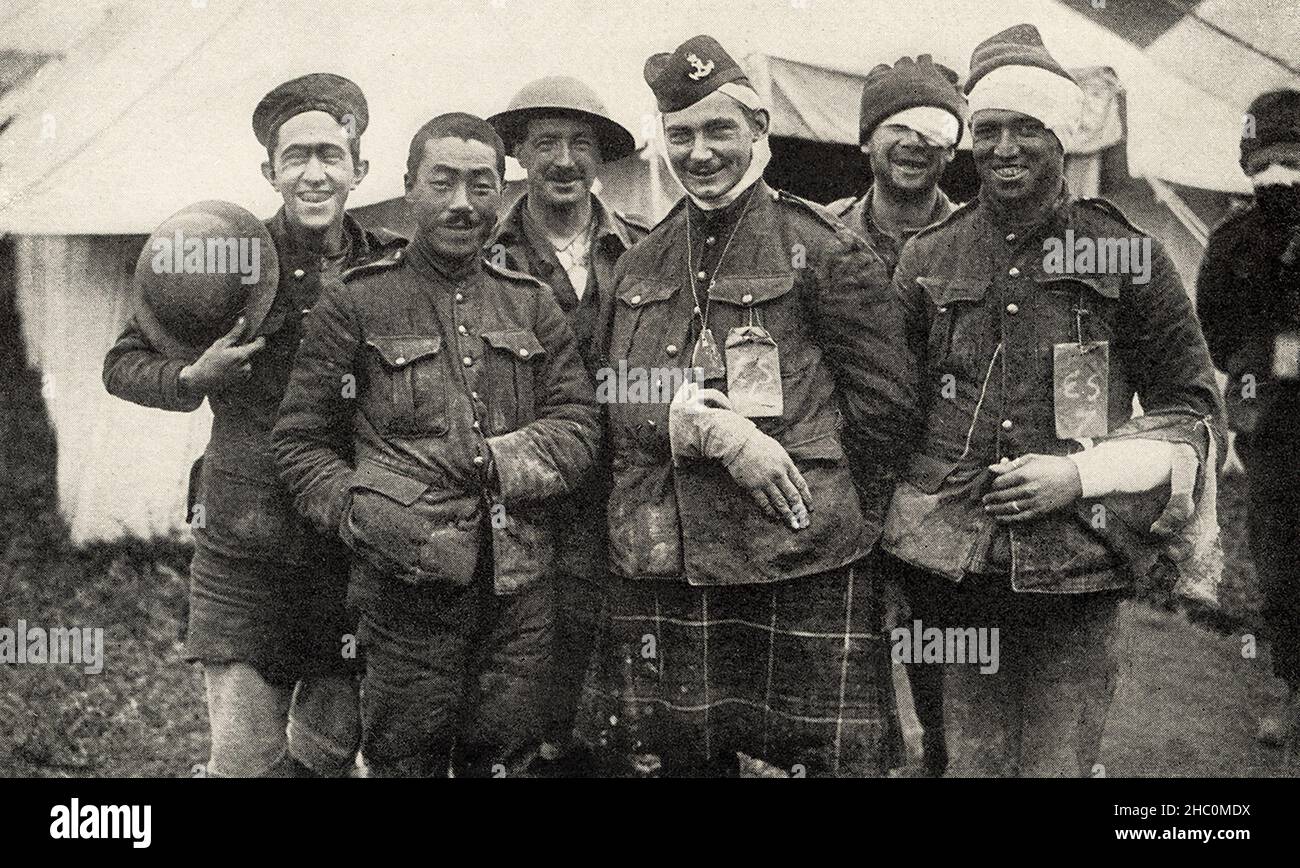 This photo shows Canadian troops who fought in World War I. The caption reads: Cheerful Beggars.  It appeared in Harold R Peat's book "Private Peat" published in 1917. Stock Photo
