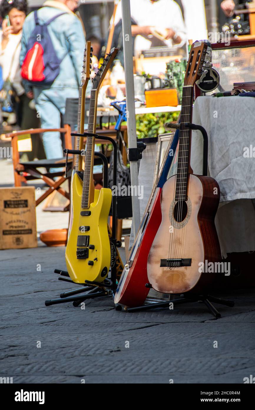 Used guitars for sale in Pescia, during the annual antiques and second-hand objects market Stock Photo