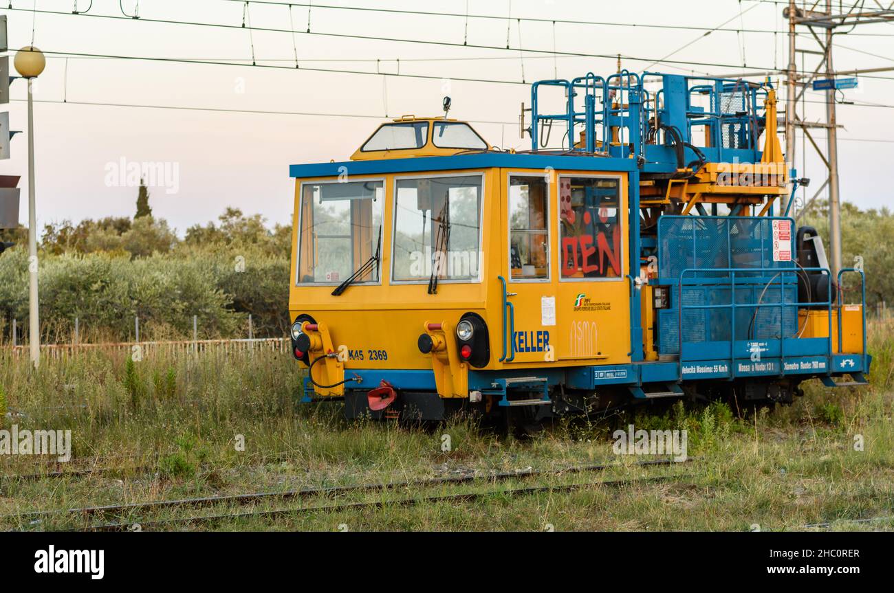 Locomotive wagons for railway line maintenance parked on a siding Stock Photo