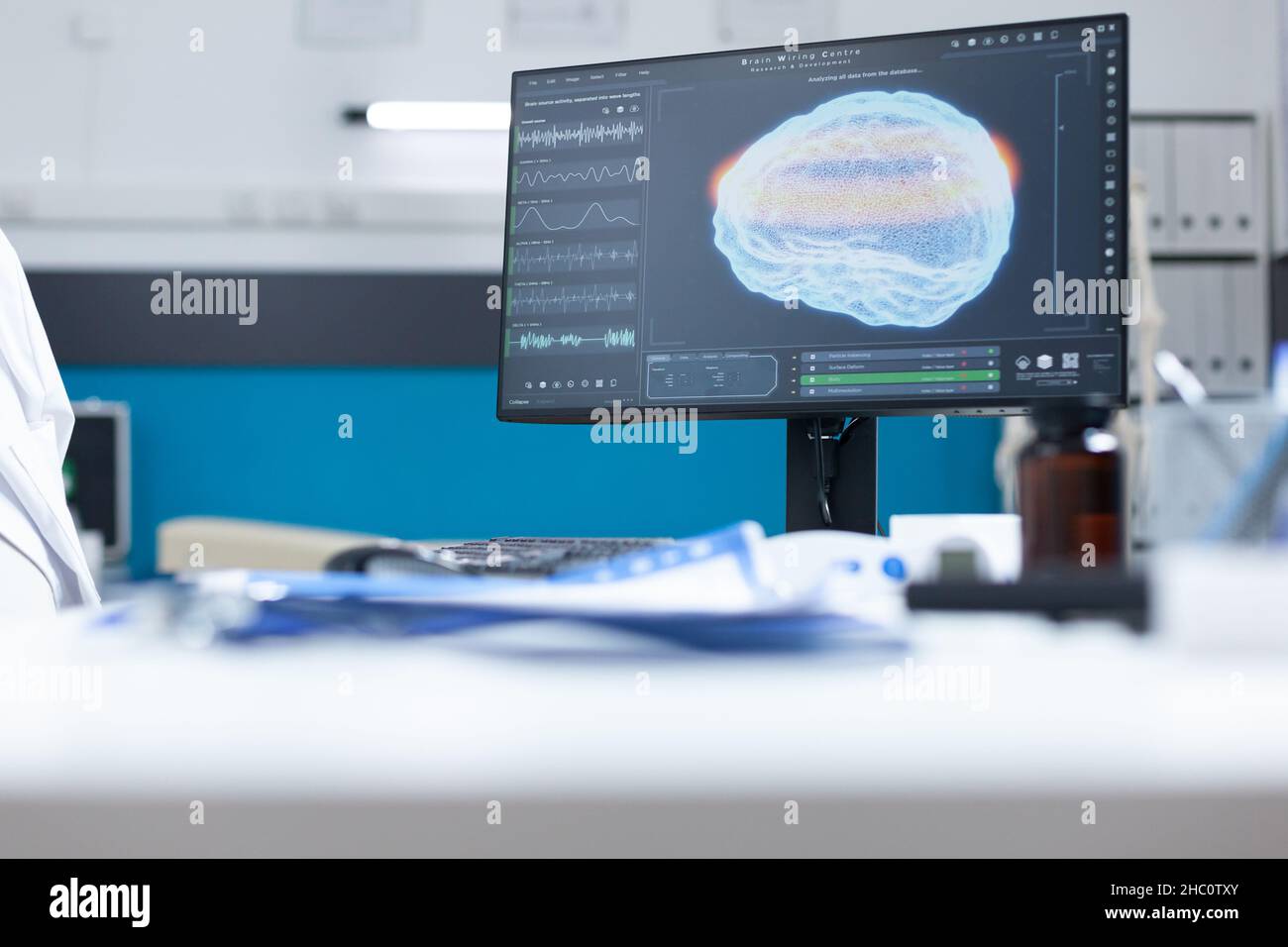 Modern Empty Hospital Office Having Computer With Mri Brain Diagaram On 