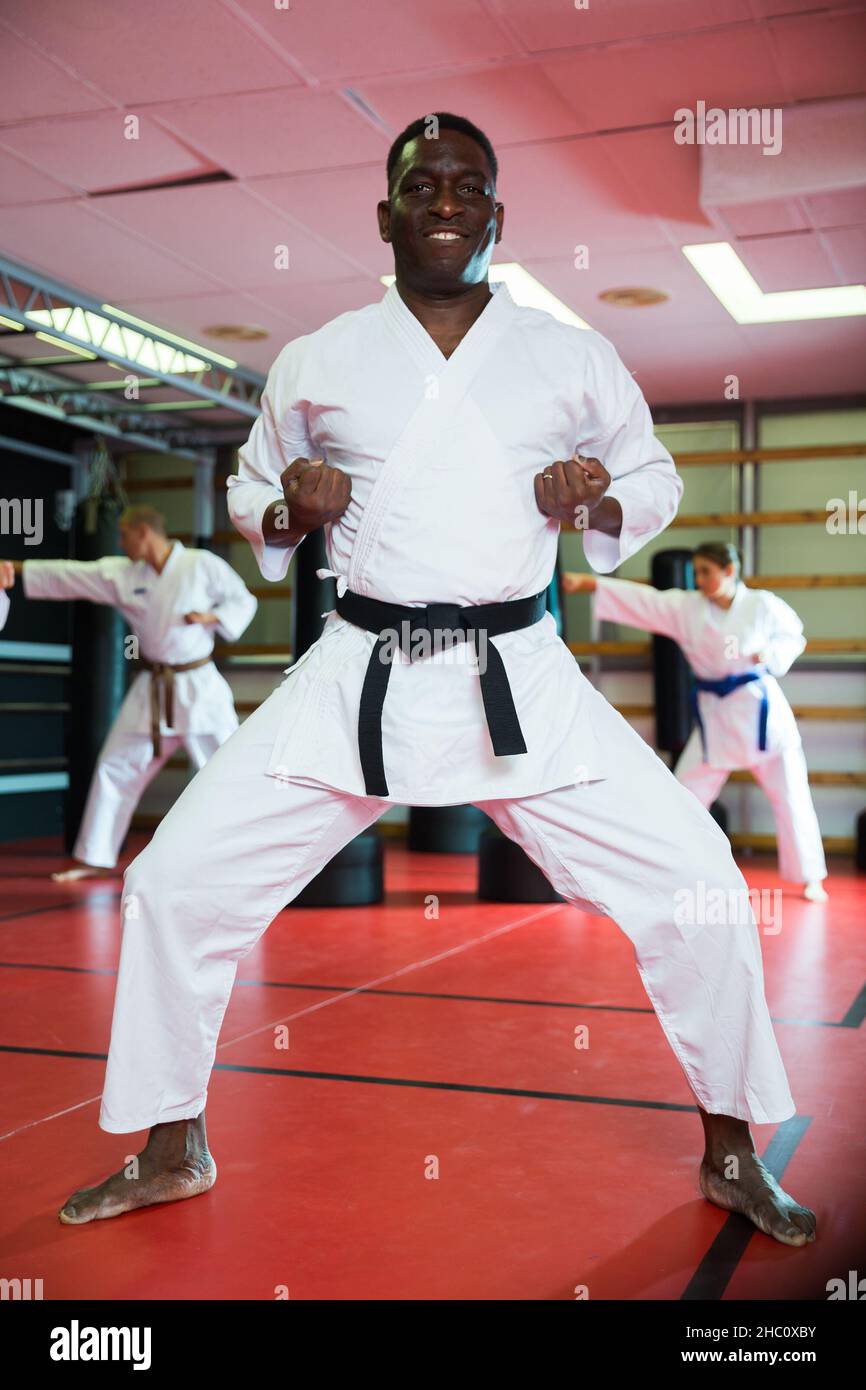 African american man in kimono fighting stance at karate training closeup  Stock Photo - Alamy