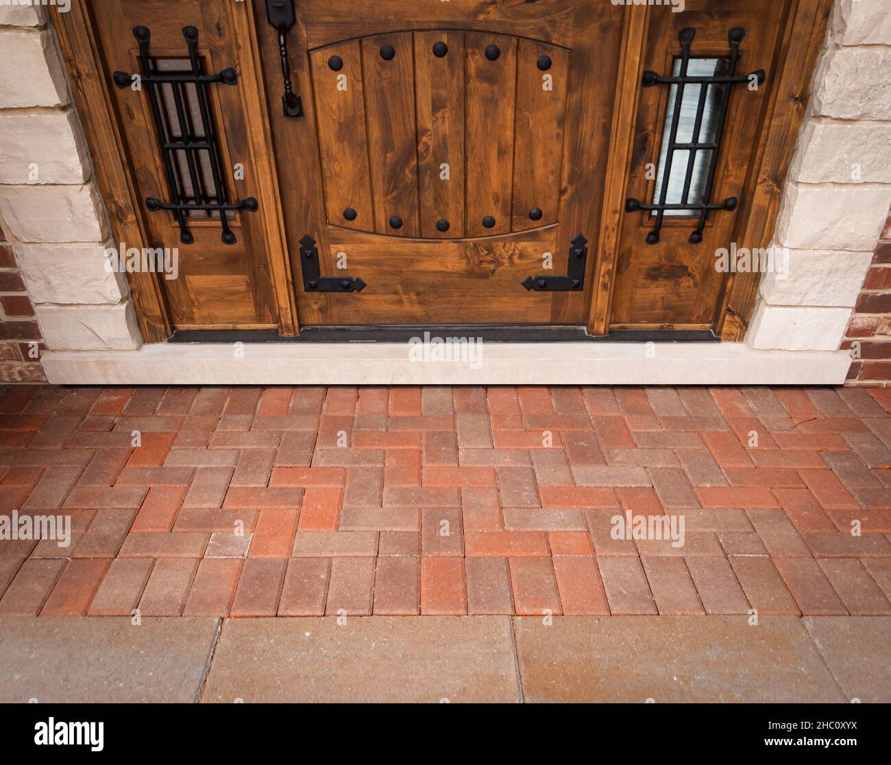 Emtpy Front Porch of House In Front of Custom Front Door. Stock Photo