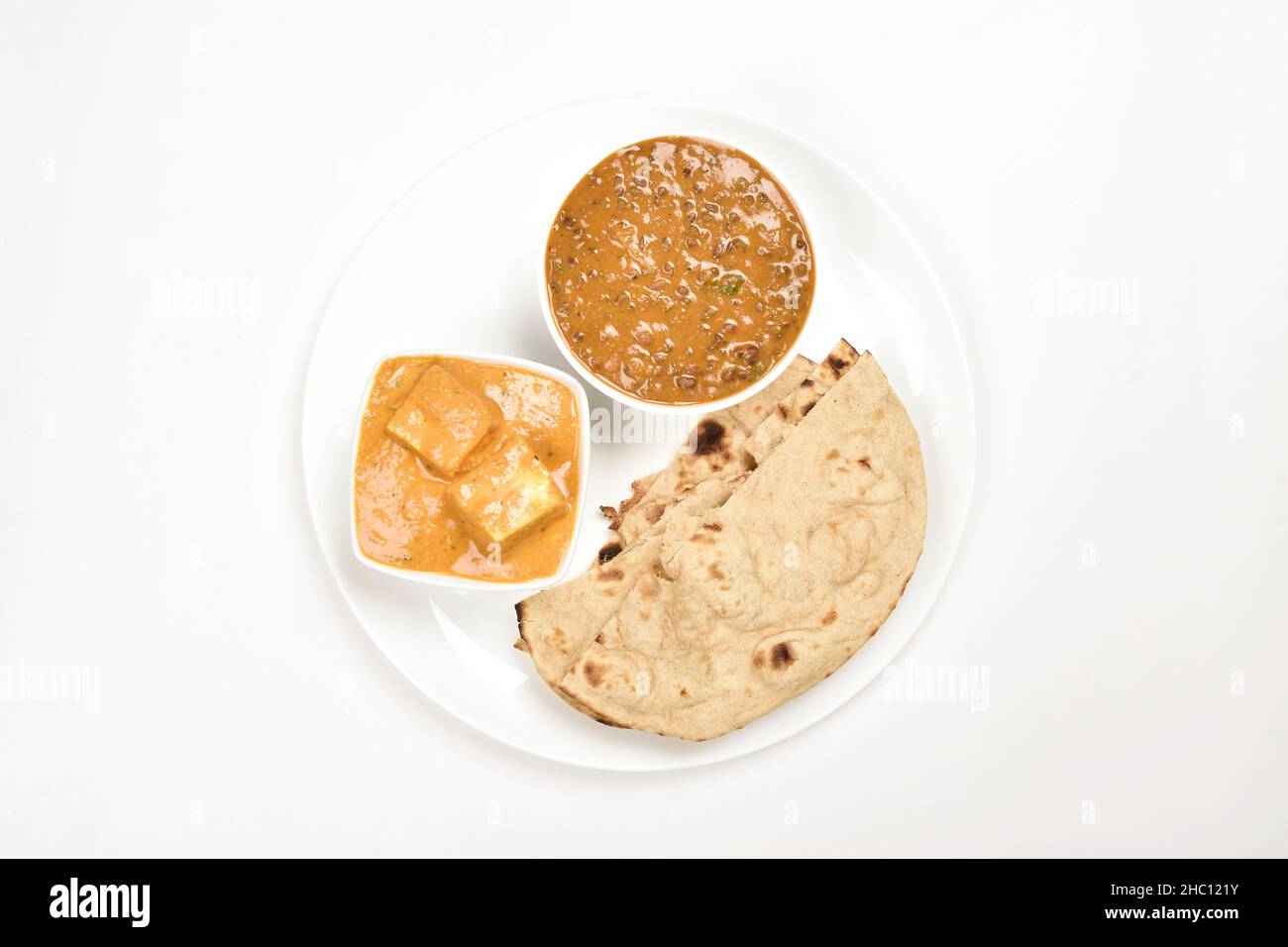 Top view of daal makhani shahi paneer and roti in plate Stock Photo - Alamy