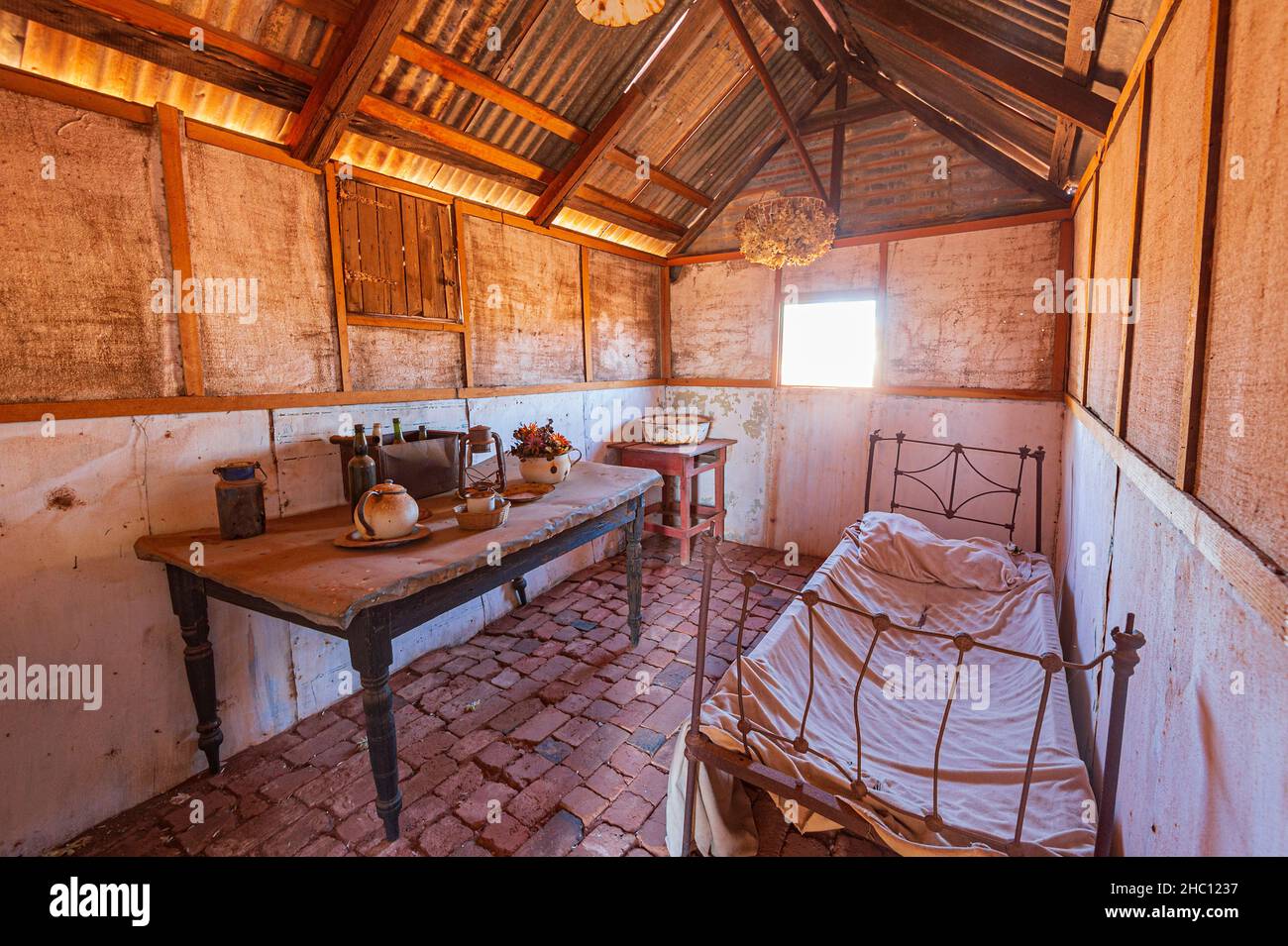 Interior of Historic corrugated iron miner's cottage from the gold rush era, Gwalia, Western Australia, WA, Australia Stock Photo