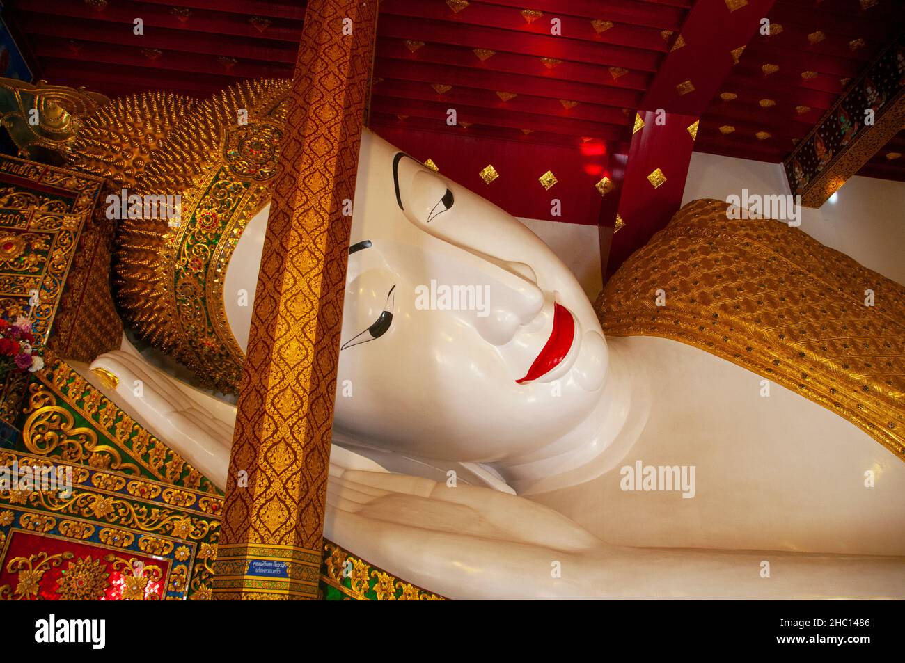 Thailand: Reclining Buddha, Wat Ban Den, Ban Inthakin, Mae Taeng District, Chiang Mai. Wat Ban Den, also known as Wat Bandensali Si Mueang Kaen, is a large Buddhist temple complex north of the city of Chiang Mai in Northern Thailand. Stock Photo