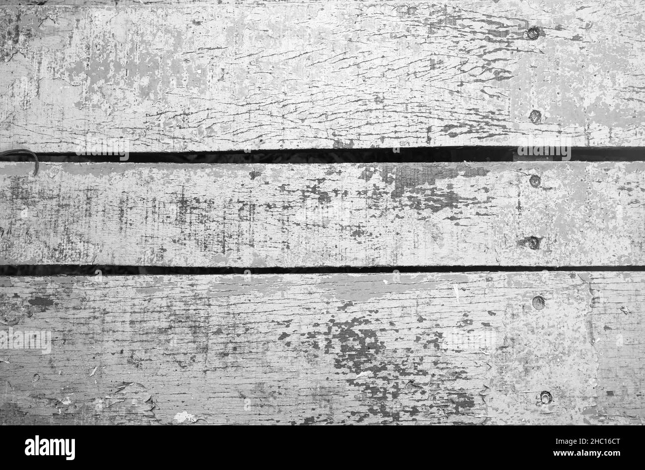 Grungy gray wooden desk, top view, background photo texture Stock Photo