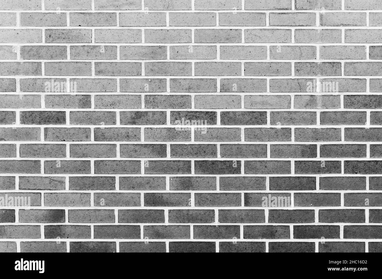 Background photo texture of decorative gray brick wall Stock Photo - Alamy