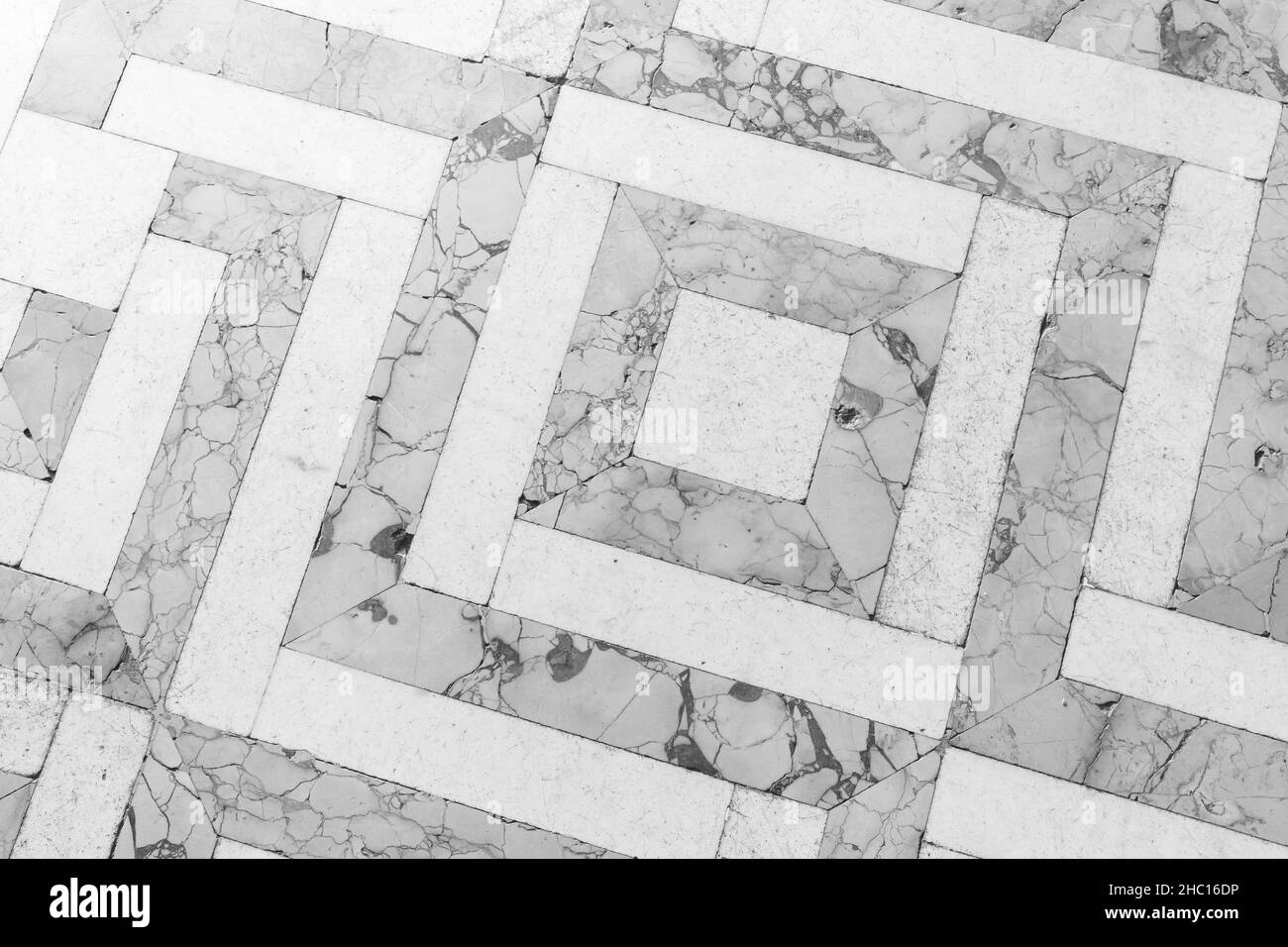 Retro style stone mosaic floor tiling with gray and white geometric ...