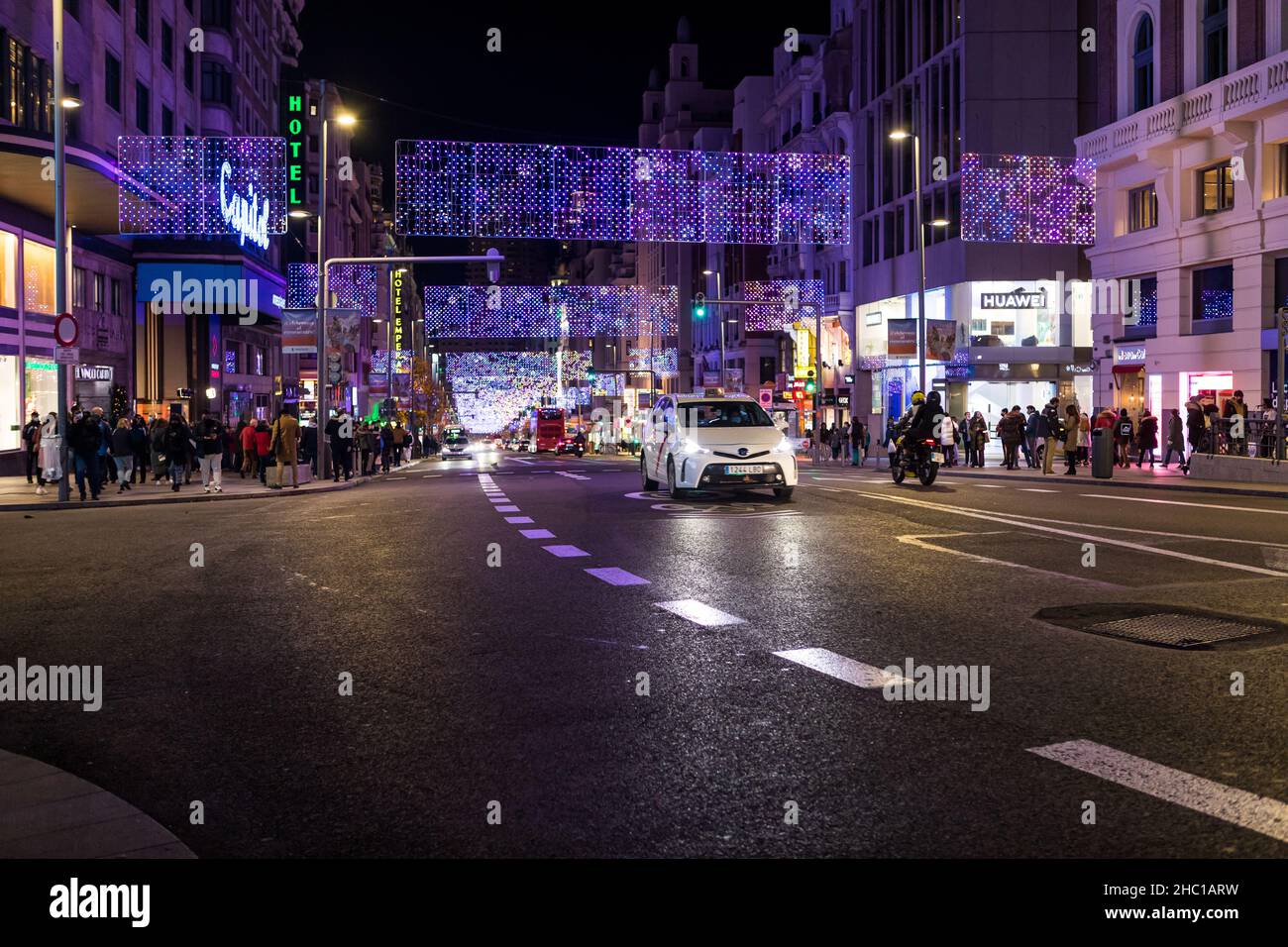 Madrid, Spain - December 13, 2021: Christmas lights shine on Gran Via street n Madrid, Spain. Stock Photo