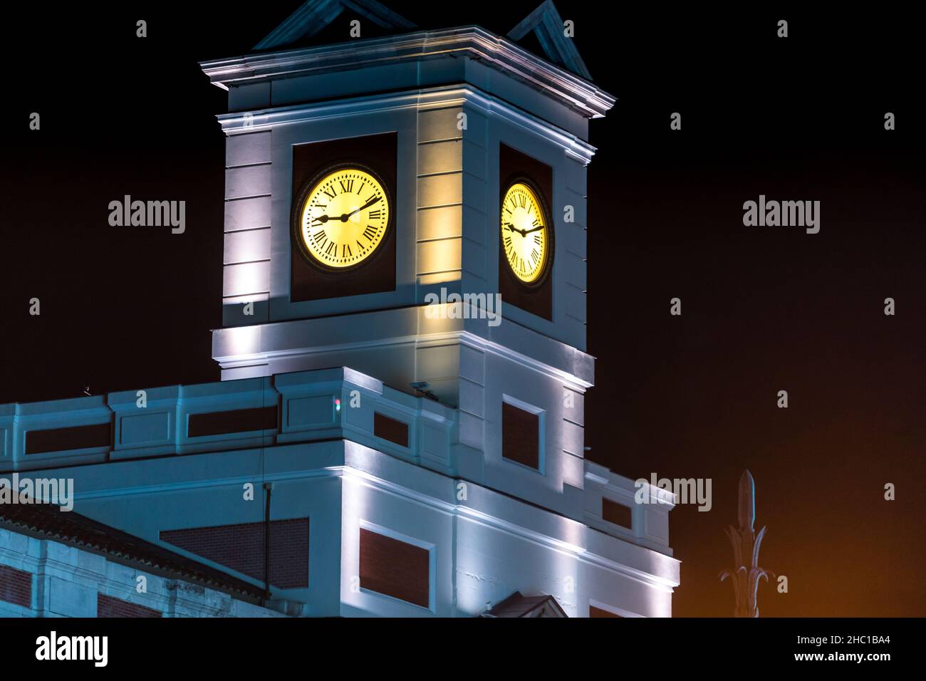 Madrid, Spain - December 13, 2021: Puerta del Sol clock at night in Madrid, Spain. Stock Photo