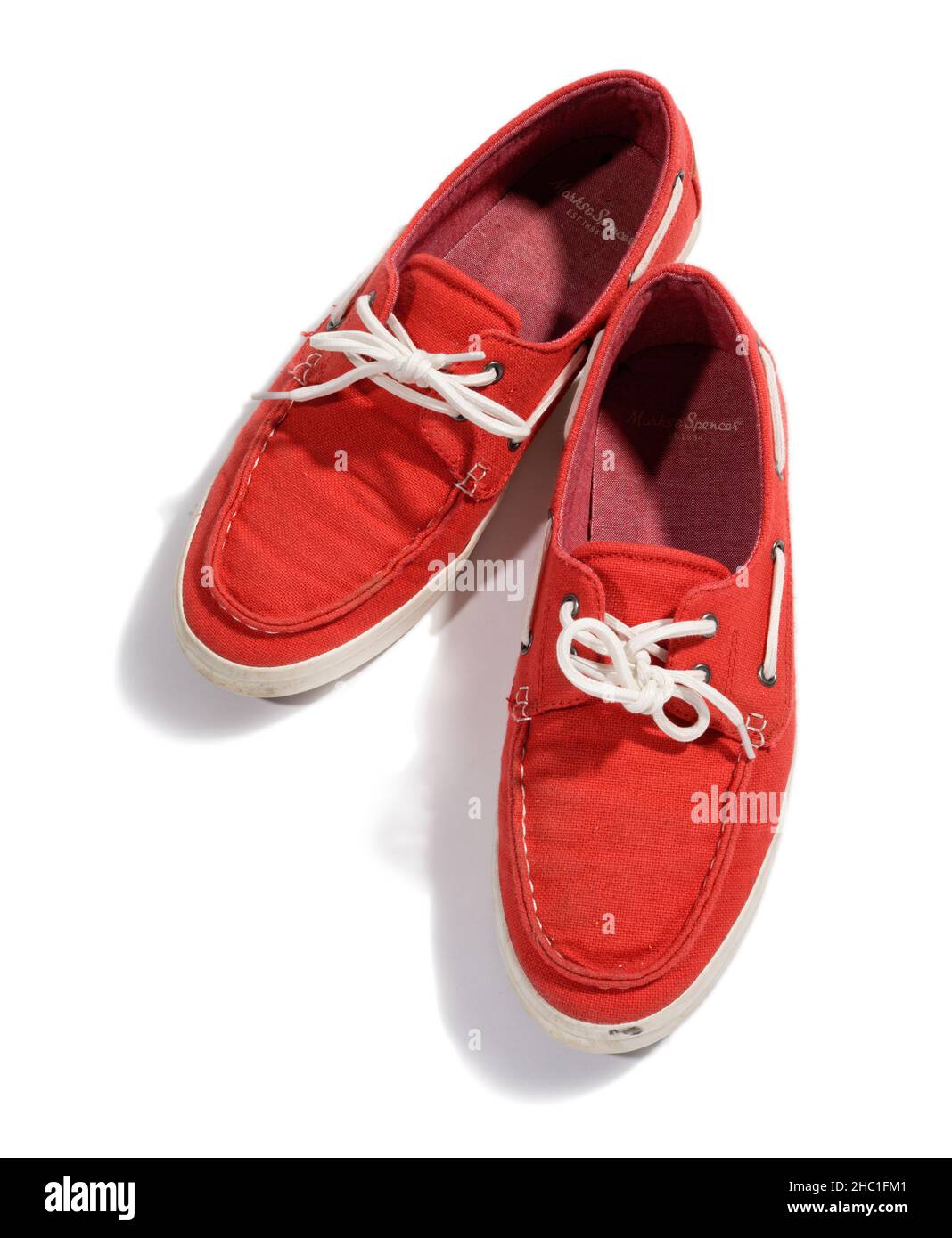 A pair of red deck shoes Stock Photo