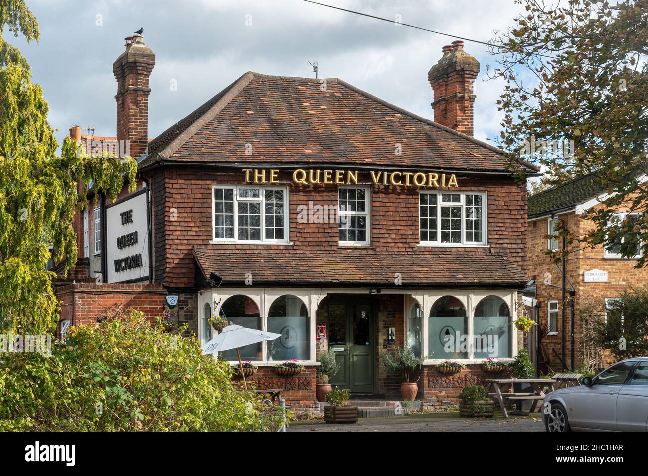 The Queen Victoria pub in Shalford village, Surrey, England, UK Stock