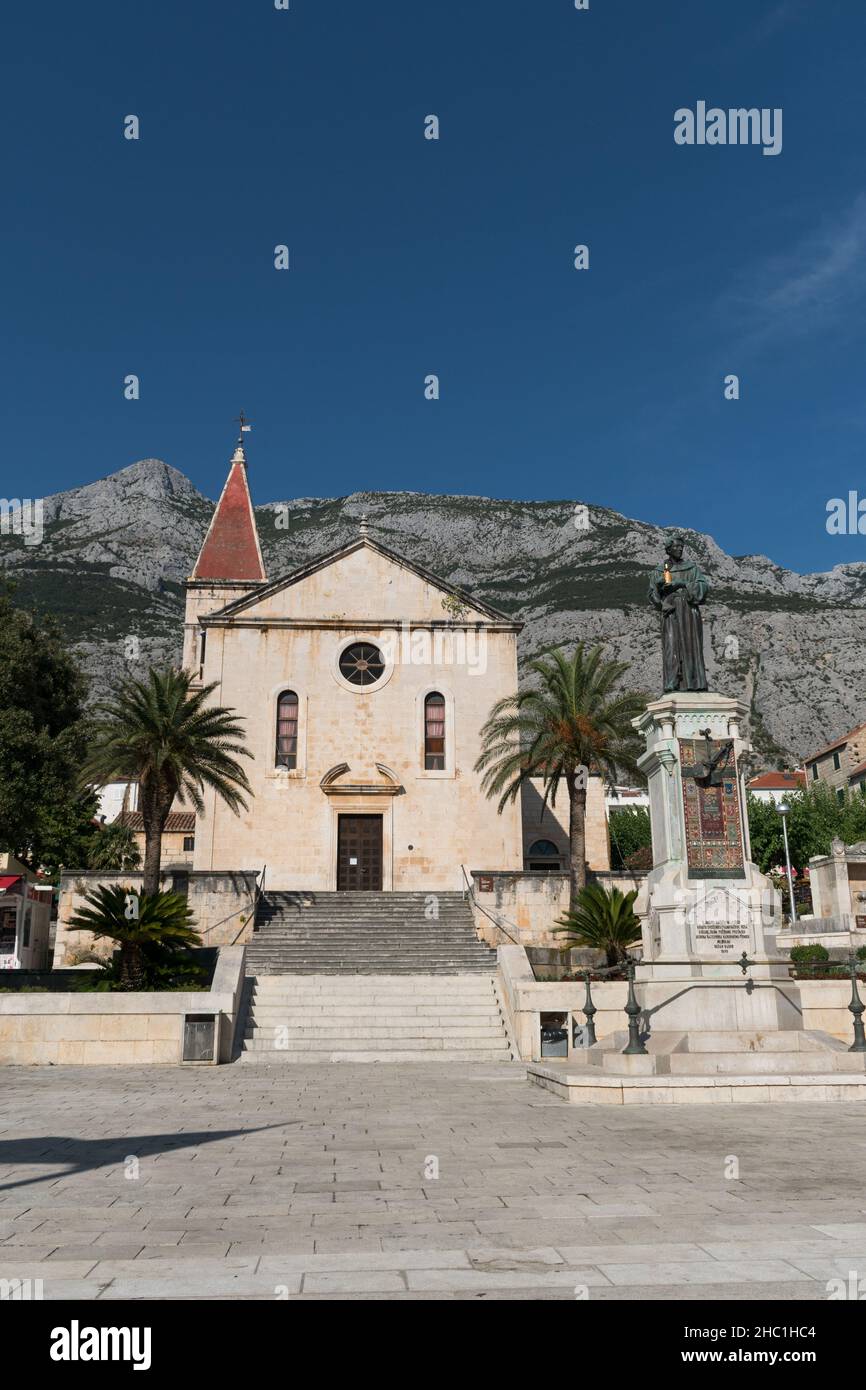 Cathedral of St. Mark and statue of Friar Andrija Kacic Miosic in town Makarska, Makarska riviera, Dalmatia, Croatia Stock Photo