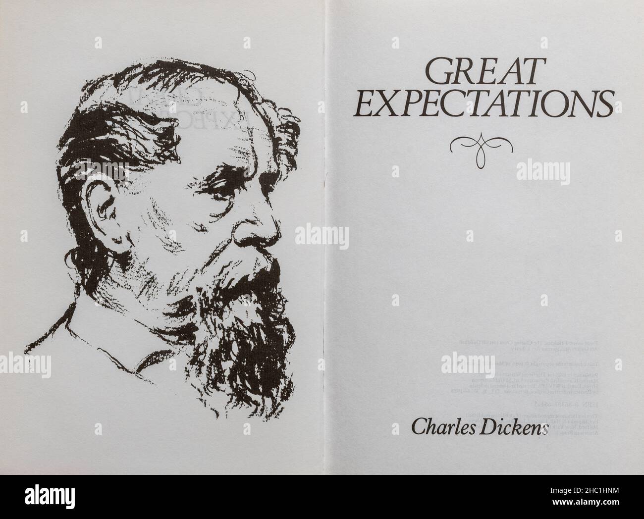 Great Expectations book - classic novel by Charles Dickens. Title page and drawing of the author. Stock Photo