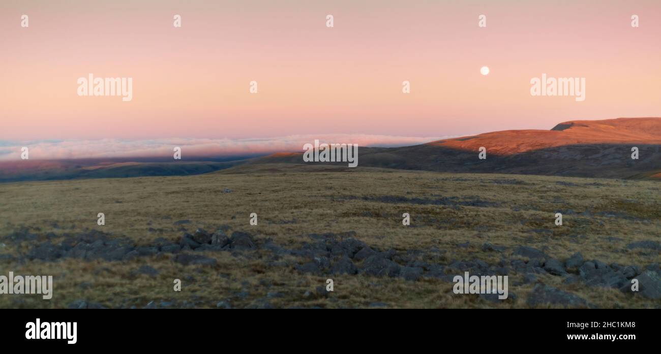 A cloud inversion and the moon on the Black Mountain in the Brecon ...