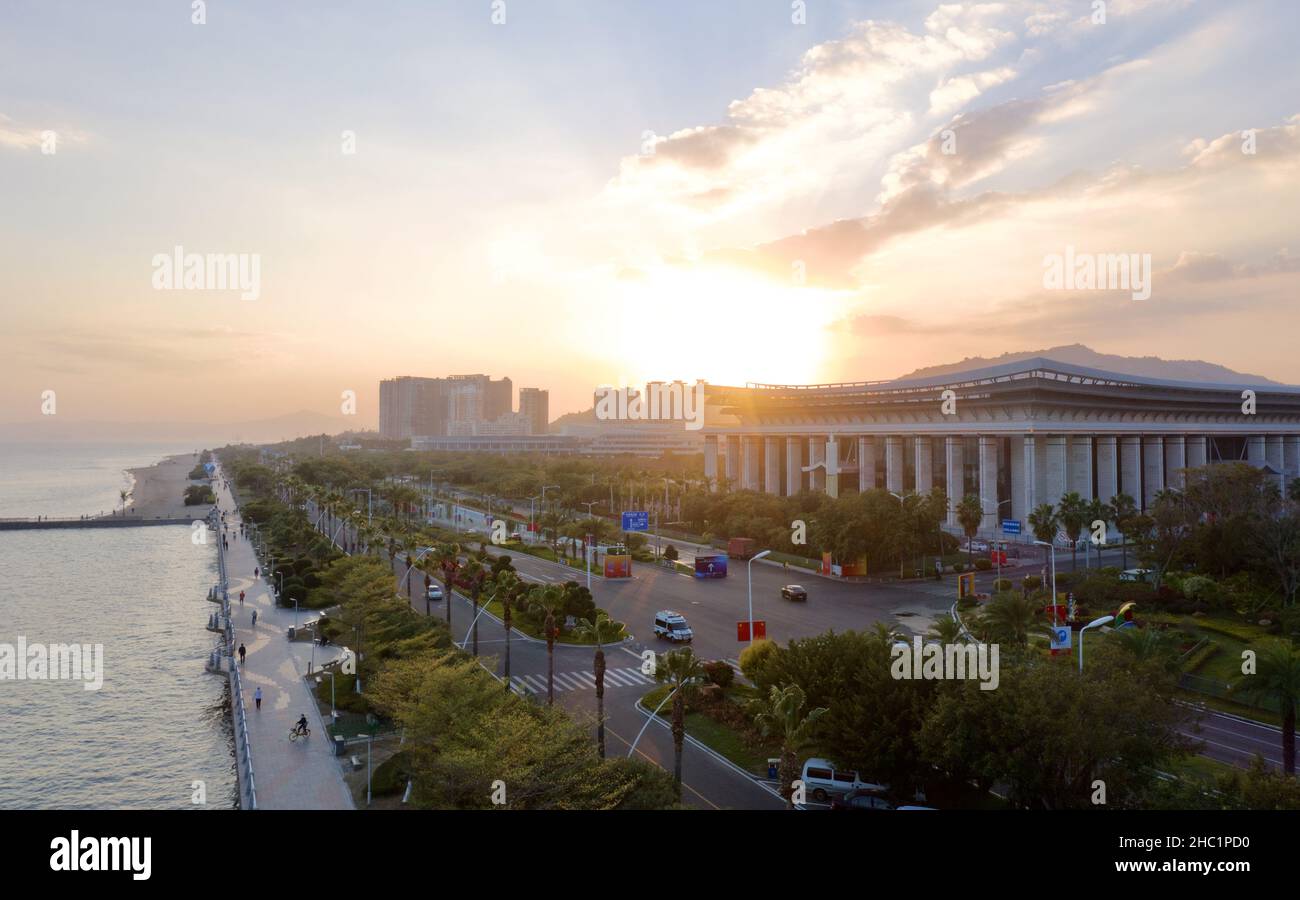 (211221) -- XIAMEN, Dec. 21, 2021 (Xinhua) -- Aerial photo taken on Dec. 9, 2021 shows the view of Xiamen International Conference & Exhibition Center in Xiamen, southeast China's Fujian Province. This year marks the 40th anniversary of the establishment of the Xiamen Special Economic Zone (SEZ). The Xiamen SEZ has made important contributions to the country's reform, opening up, and socialist modernization, and played a unique role in promoting national reunification. (Xinhua/Jiang Kehong) Stock Photo