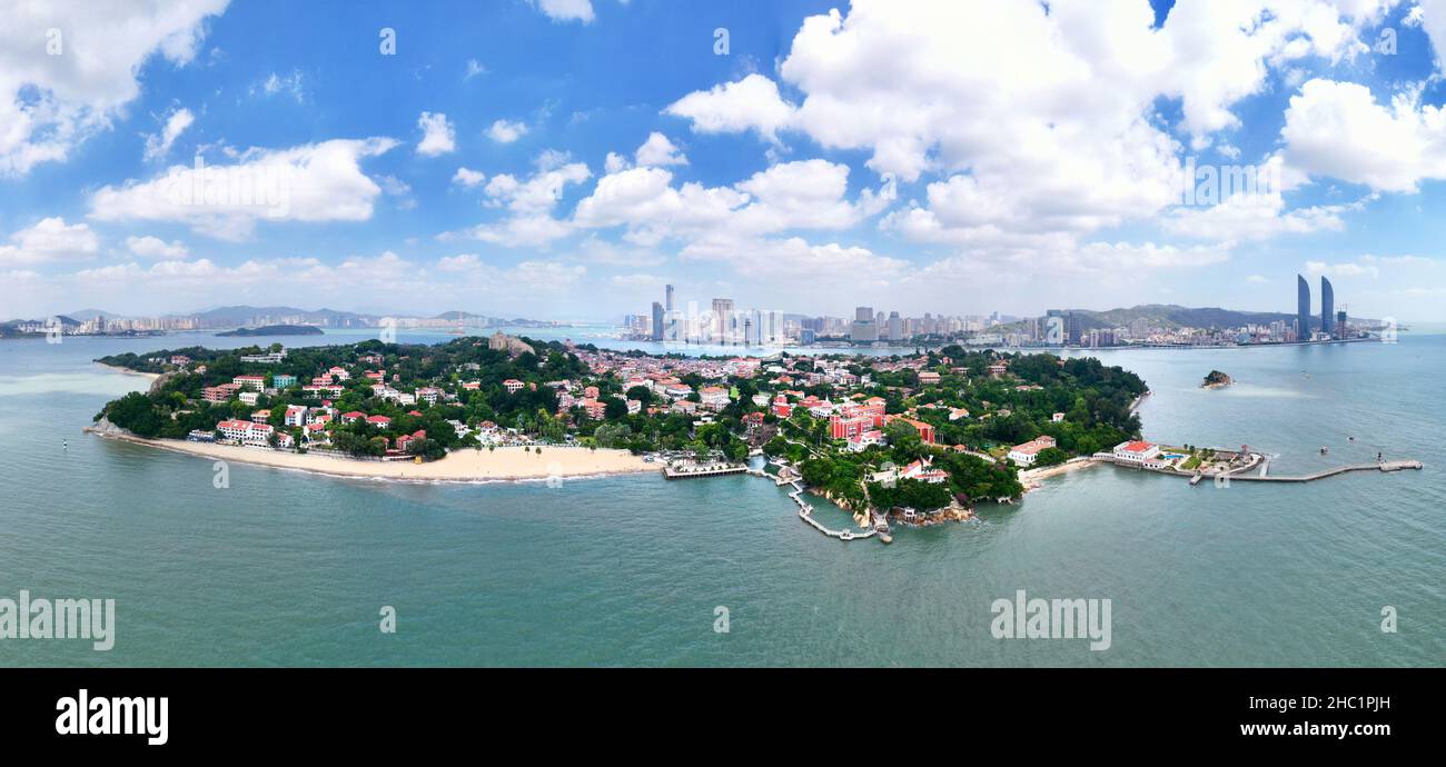 (211221) -- XIAMEN, Dec. 21, 2021 (Xinhua) -- Aerial photo taken on Oct. 6, 2021 shows the view of Gulangyu Island in Xiamen, southeast China's Fujian Province. This year marks the 40th anniversary of the establishment of the Xiamen Special Economic Zone (SEZ). The Xiamen SEZ has made important contributions to the country's reform, opening up, and socialist modernization, and played a unique role in promoting national reunification. (Xinhua/Jiang Kehong) Stock Photo