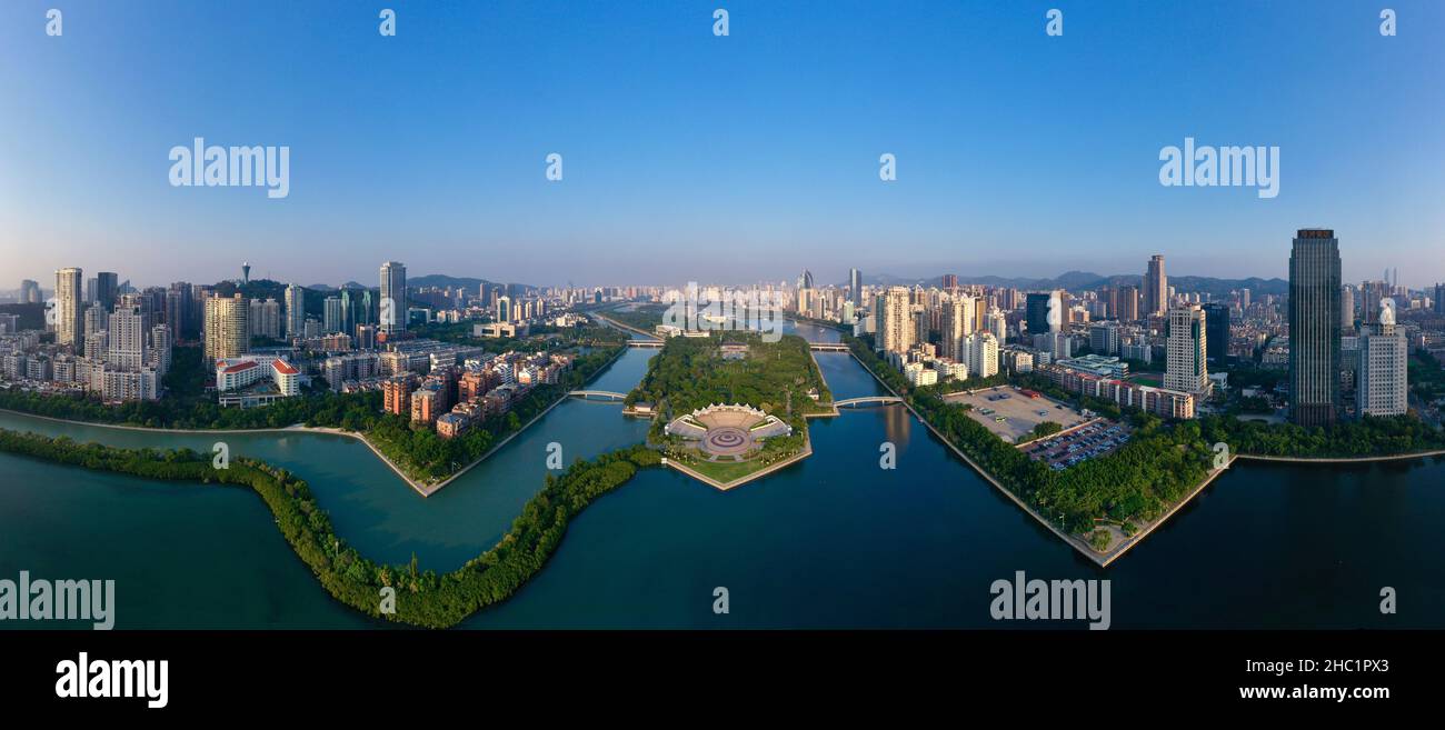 (211221) -- XIAMEN, Dec. 21, 2021 (Xinhua) -- Aerial photo taken on Sept. 29, 2021 shows the city view of Xiamen, southeast China's Fujian Province. This year marks the 40th anniversary of the establishment of the Xiamen Special Economic Zone (SEZ). The Xiamen SEZ has made important contributions to the country's reform, opening up, and socialist modernization, and played a unique role in promoting national reunification. (Xinhua/Jiang Kehong) Stock Photo