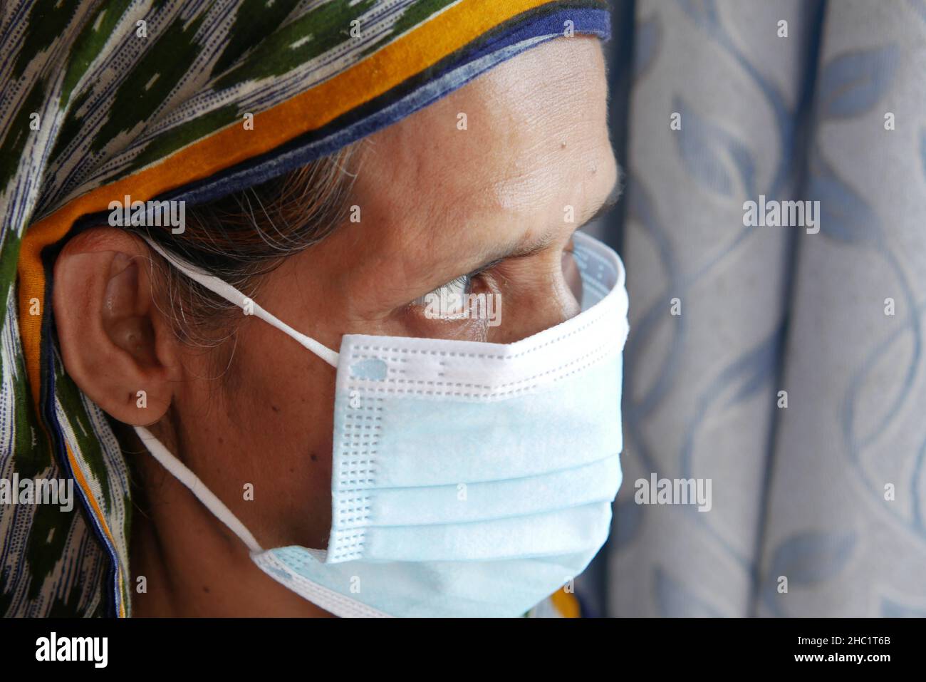 Portrait senior women wearing mask home hi-res stock photography and ...