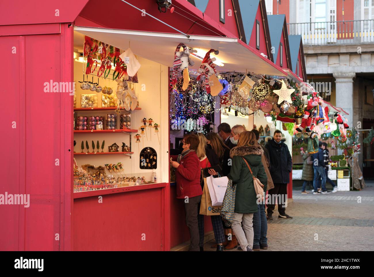View of Christmas market stalls selling christmas decorations in the