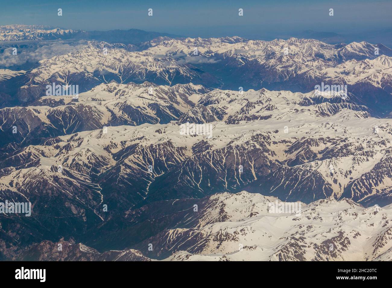 Aerial view of snow covered Tian Shan mountains in Kyrgyzstan Stock ...