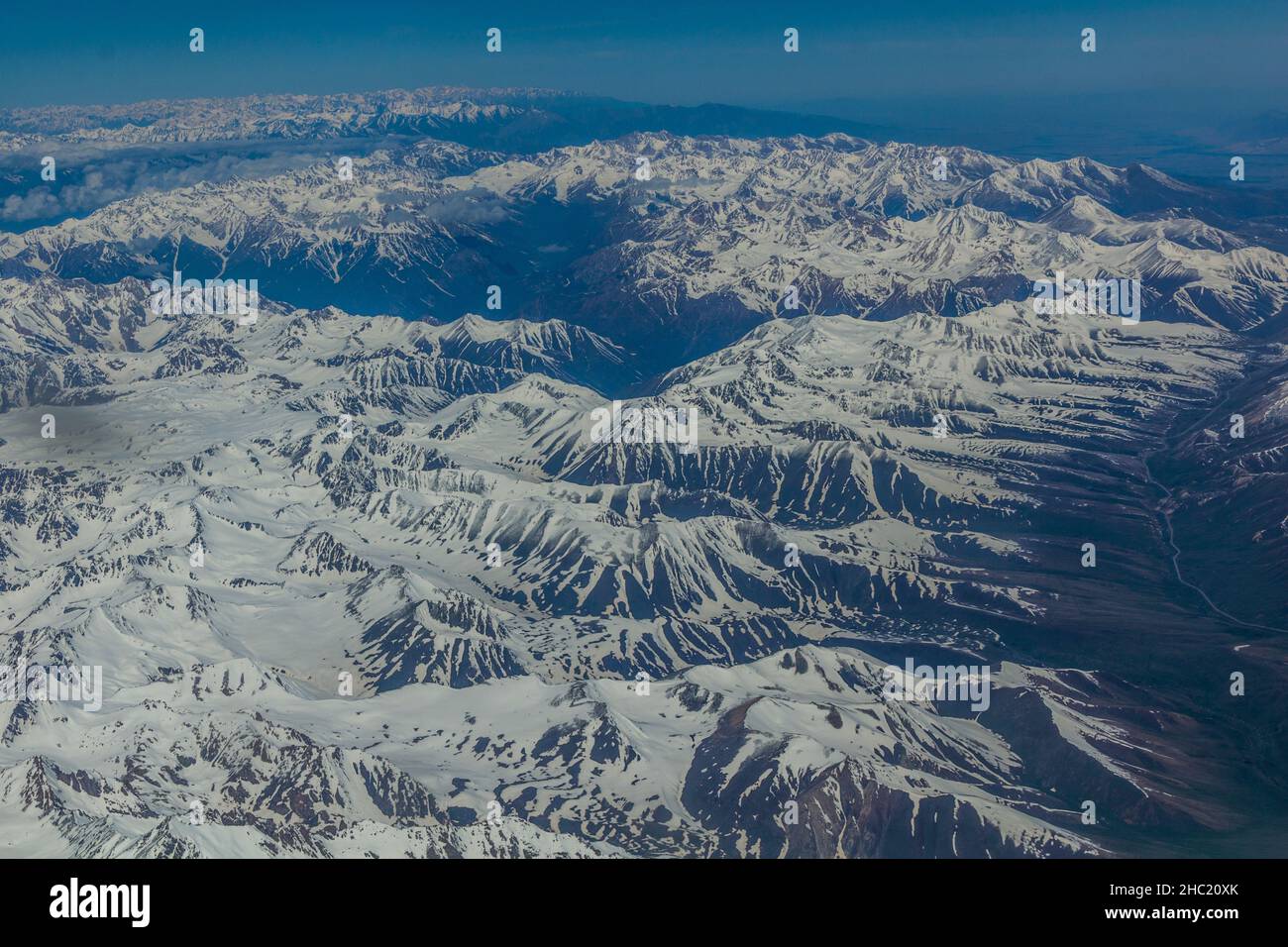Aerial view of snow covered Tian Shan mountains in Kyrgyzstan Stock ...