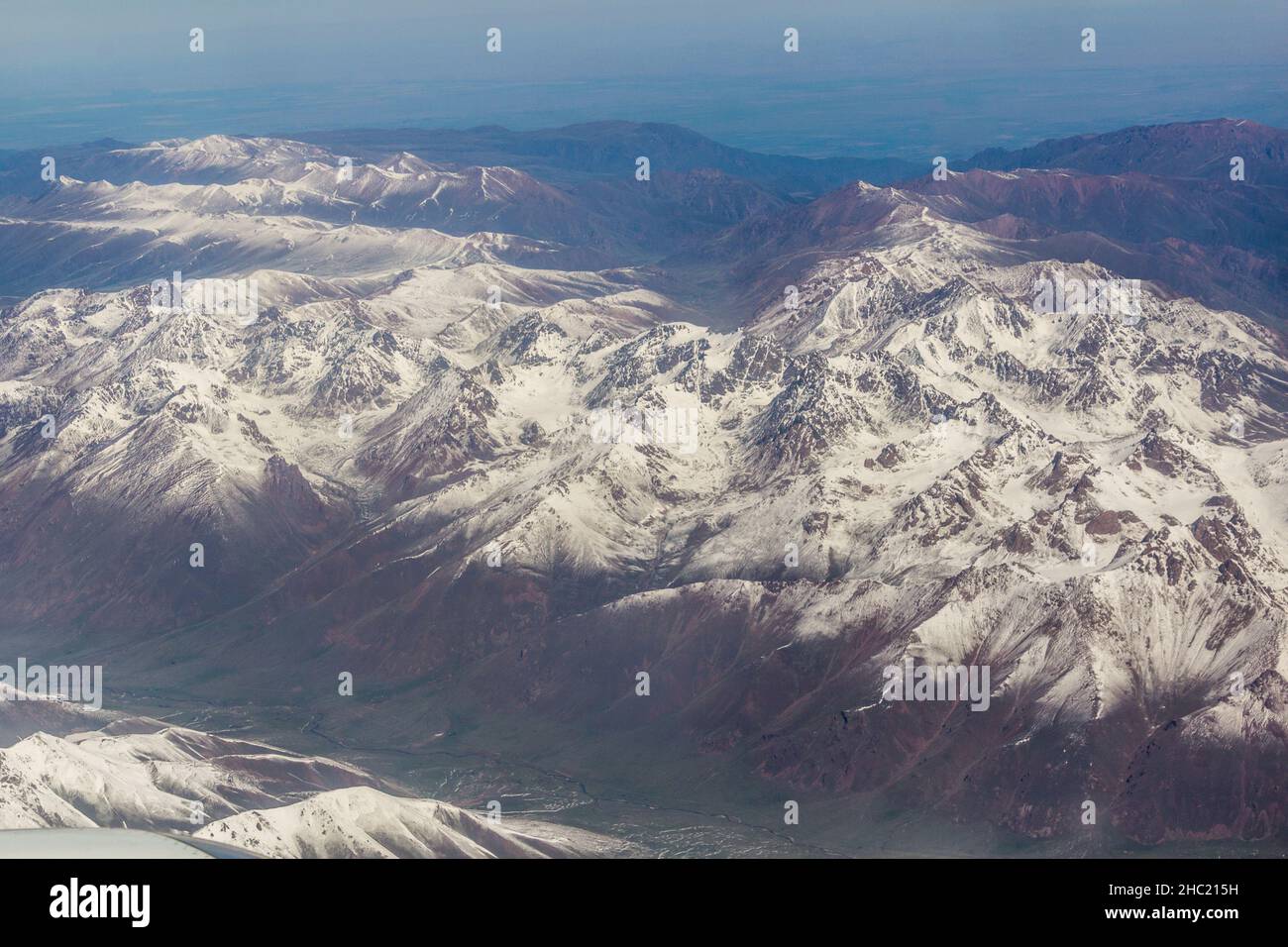 Aerial view of snow covered Tian Shan mountains in Kyrgyzstan Stock ...