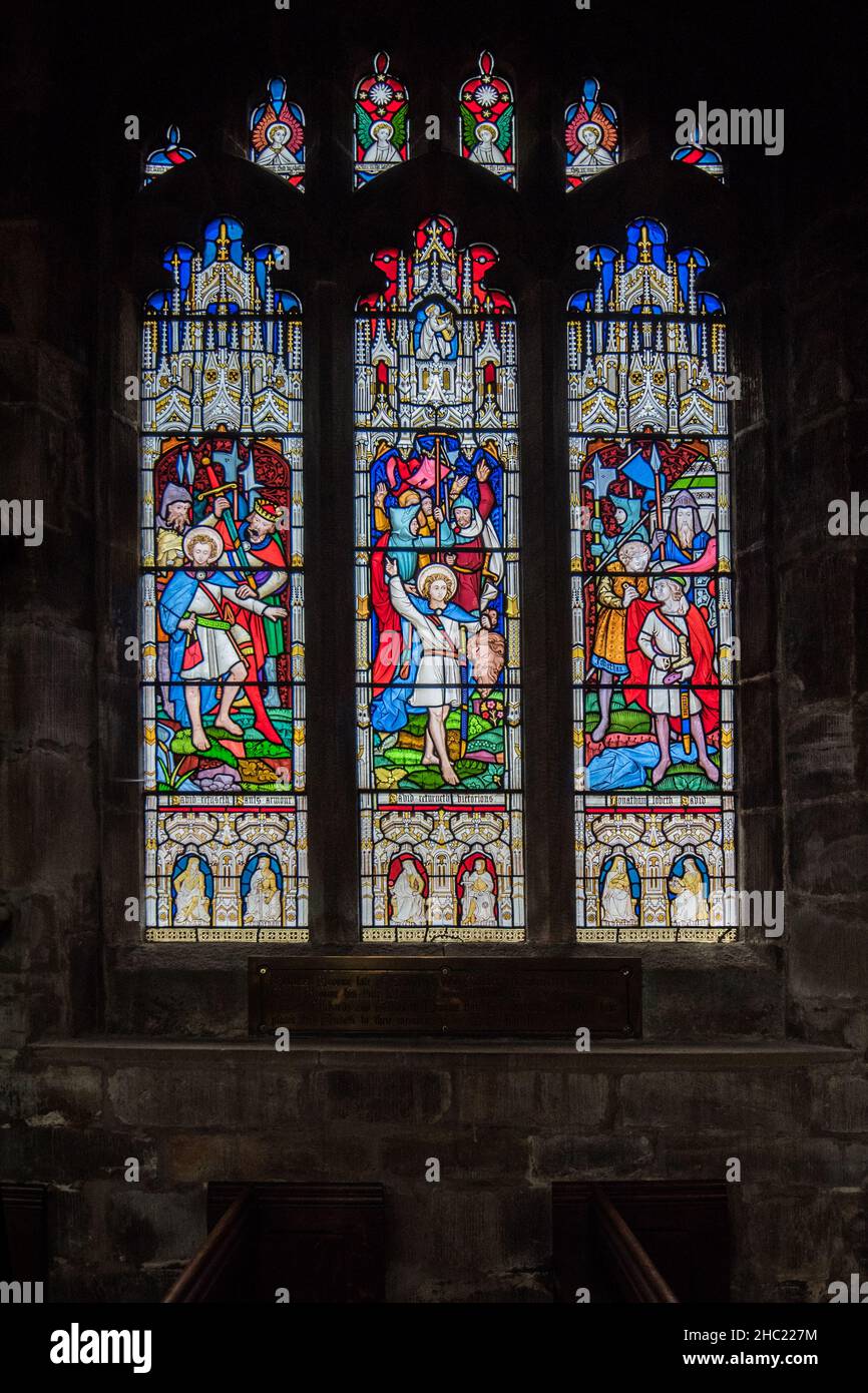Stained glass windows alongside the North aisle in St Marys church Sandbach, Cheshire Stock Photo