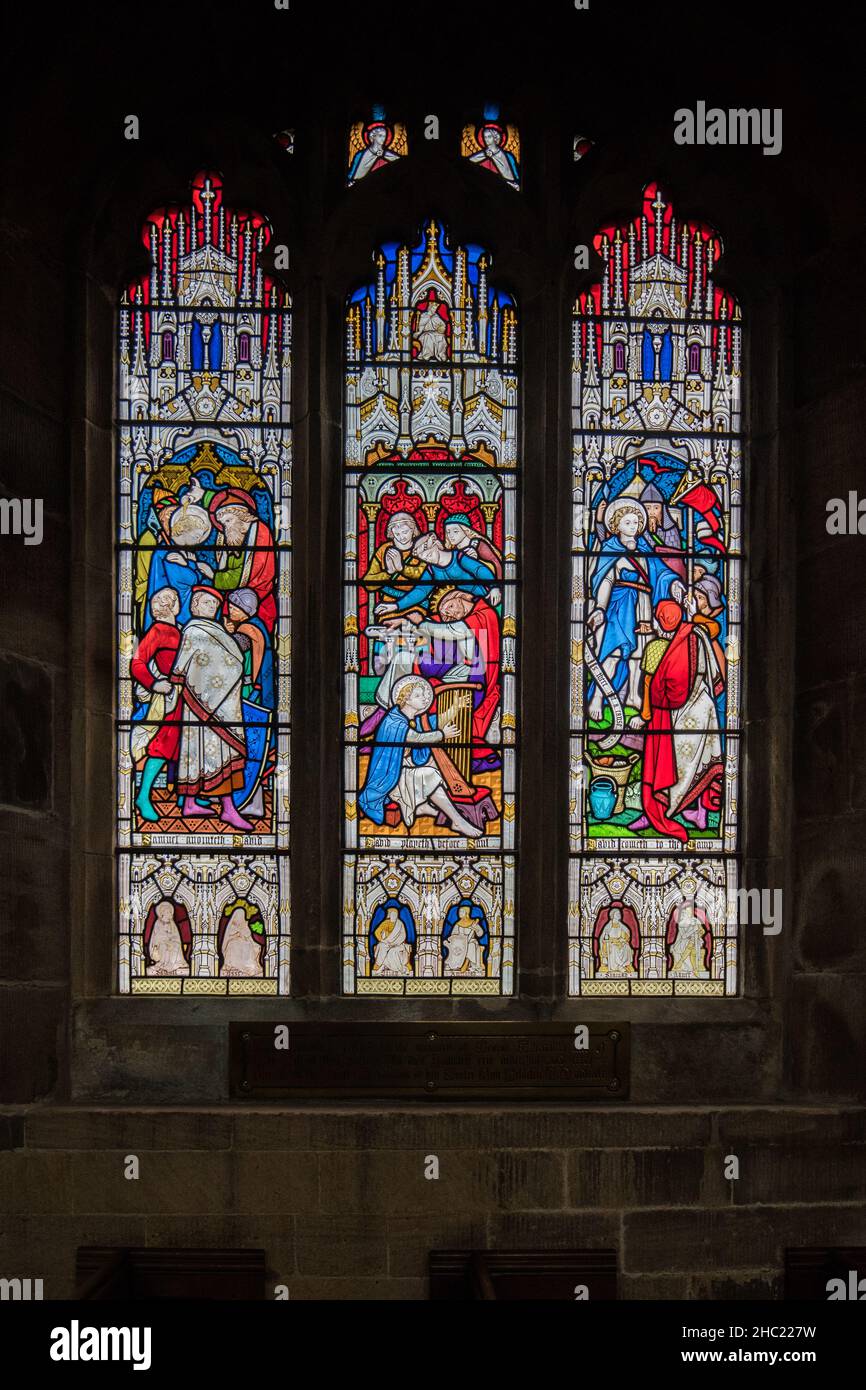 Stained glass windows alongside the North aisle in St Marys church Sandbach, Cheshire Stock Photo