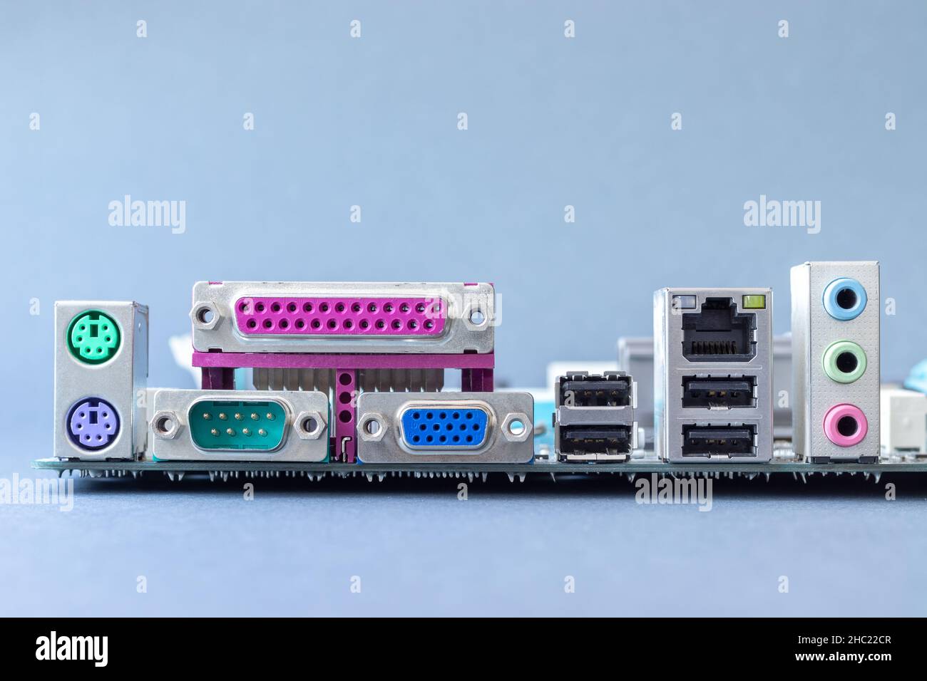 Motherboard back panel connectors closeup on gray background. Selective focus Stock Photo Alamy