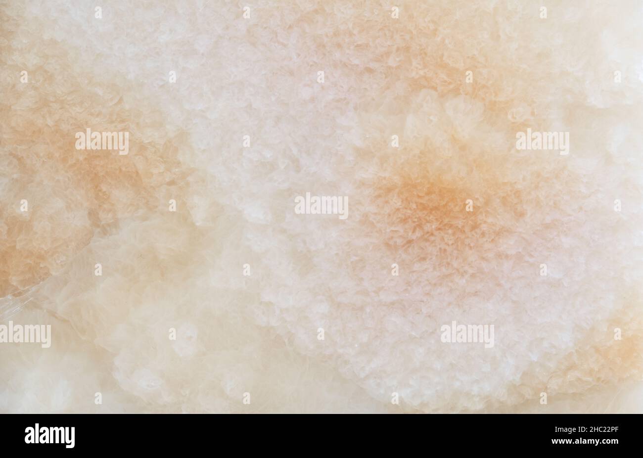 Rock abstract warm beige stone natural background Stock Photo - Alamy