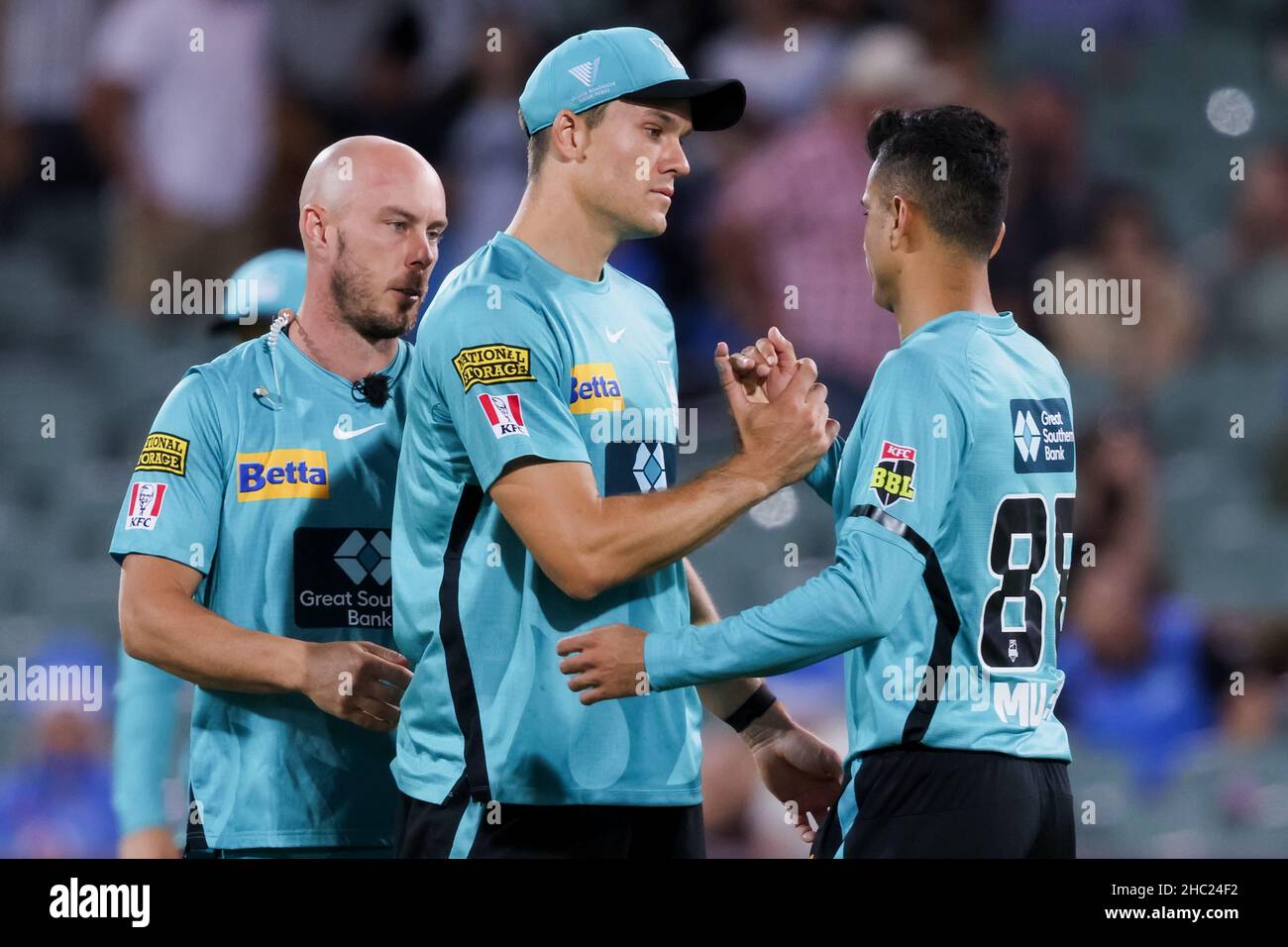 Adelaide, Australia, 23 December, 2021. Brisbane players celebrate a win during the Big Bash