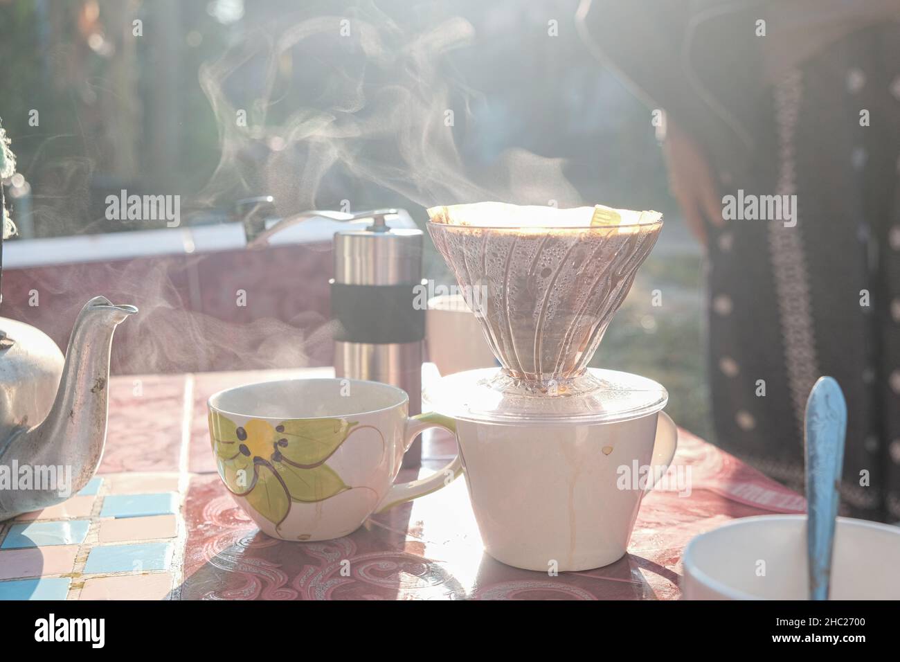 Coffee drip and smoke with group of people friend hand grind coffee in