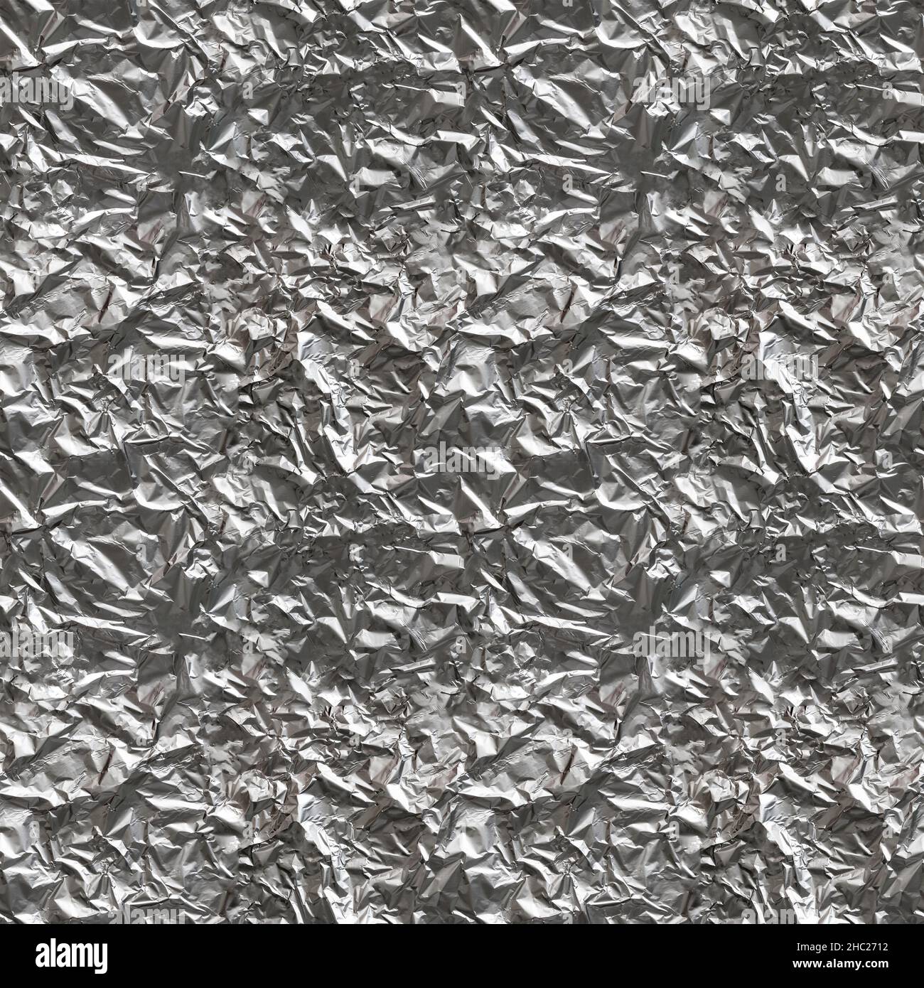 https://c8.alamy.com/comp/2HC2712/seamless-texture-of-crumpled-aluminum-foil-sheet-four-fragments-in-one-top-view-2HC2712.jpg