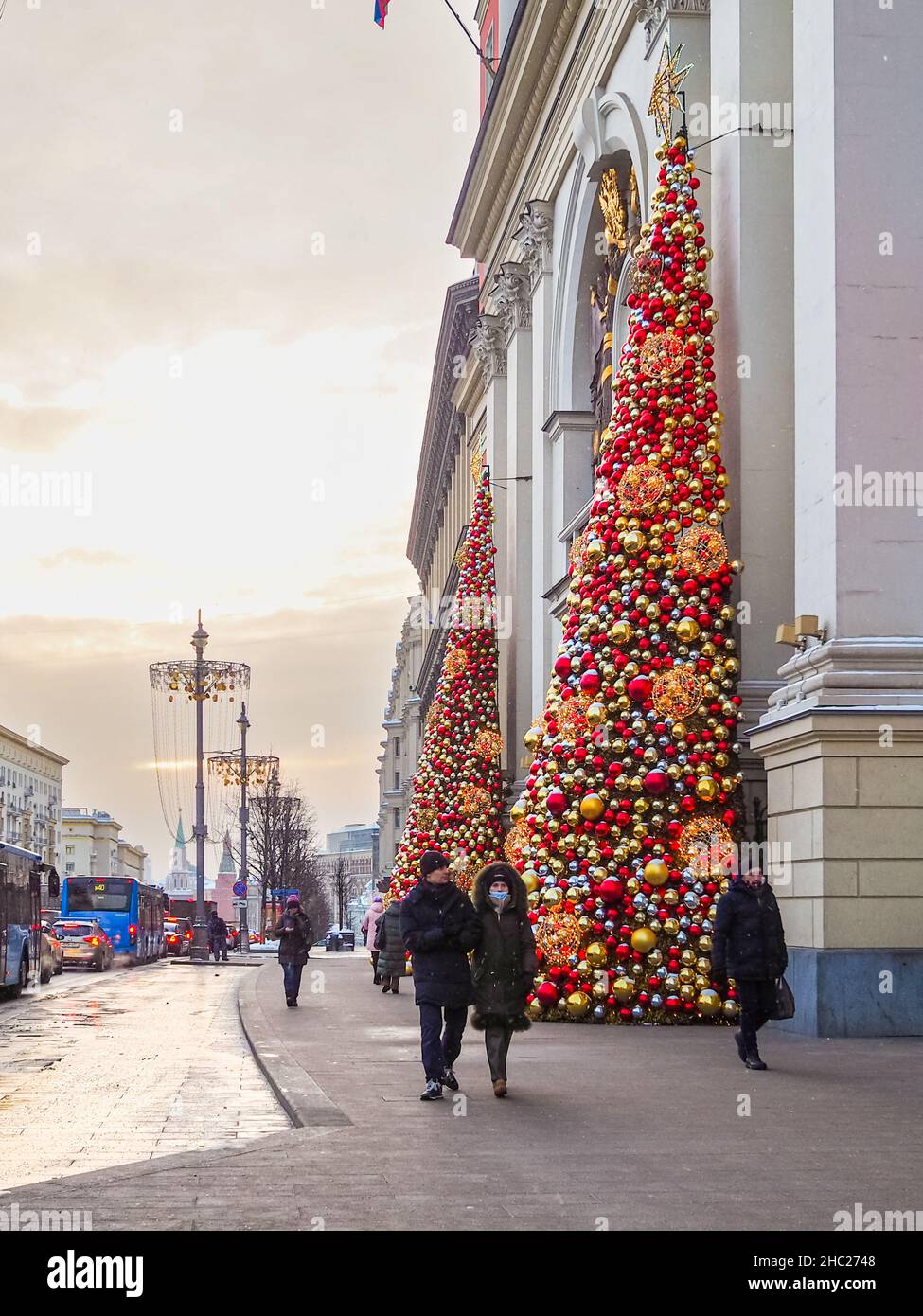 Moscow. Russia. December 23, 2021. A view of Christmas installations made of multi-colored balls in the form of fir trees near the facade of the Moscow mayor's office. Selective focus. Stock Photo