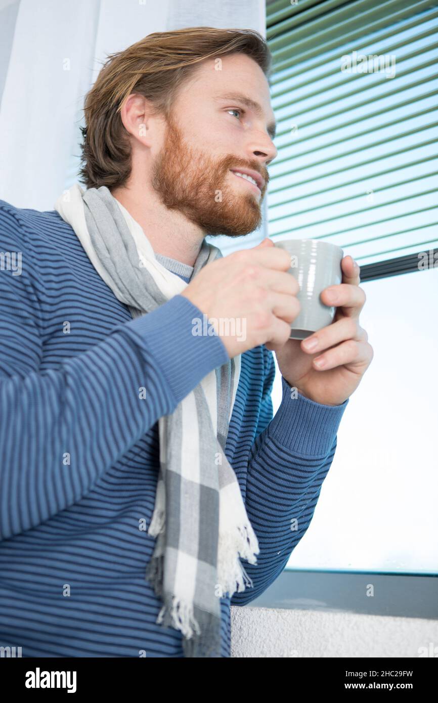 Focused Man Drinking From Cup Stock Photo - Download Image Now - Men,  Coffee - Drink, Window - iStock